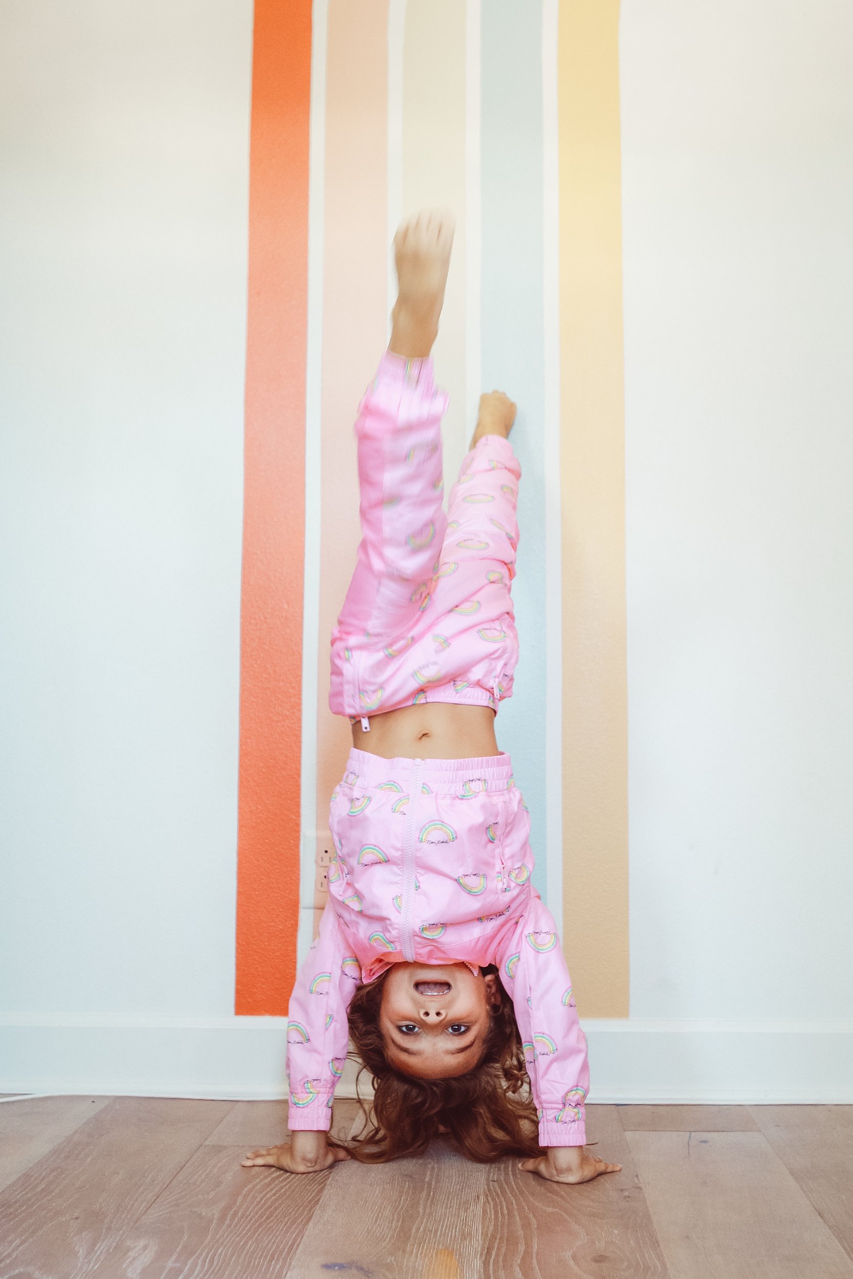 kid doing a handstand