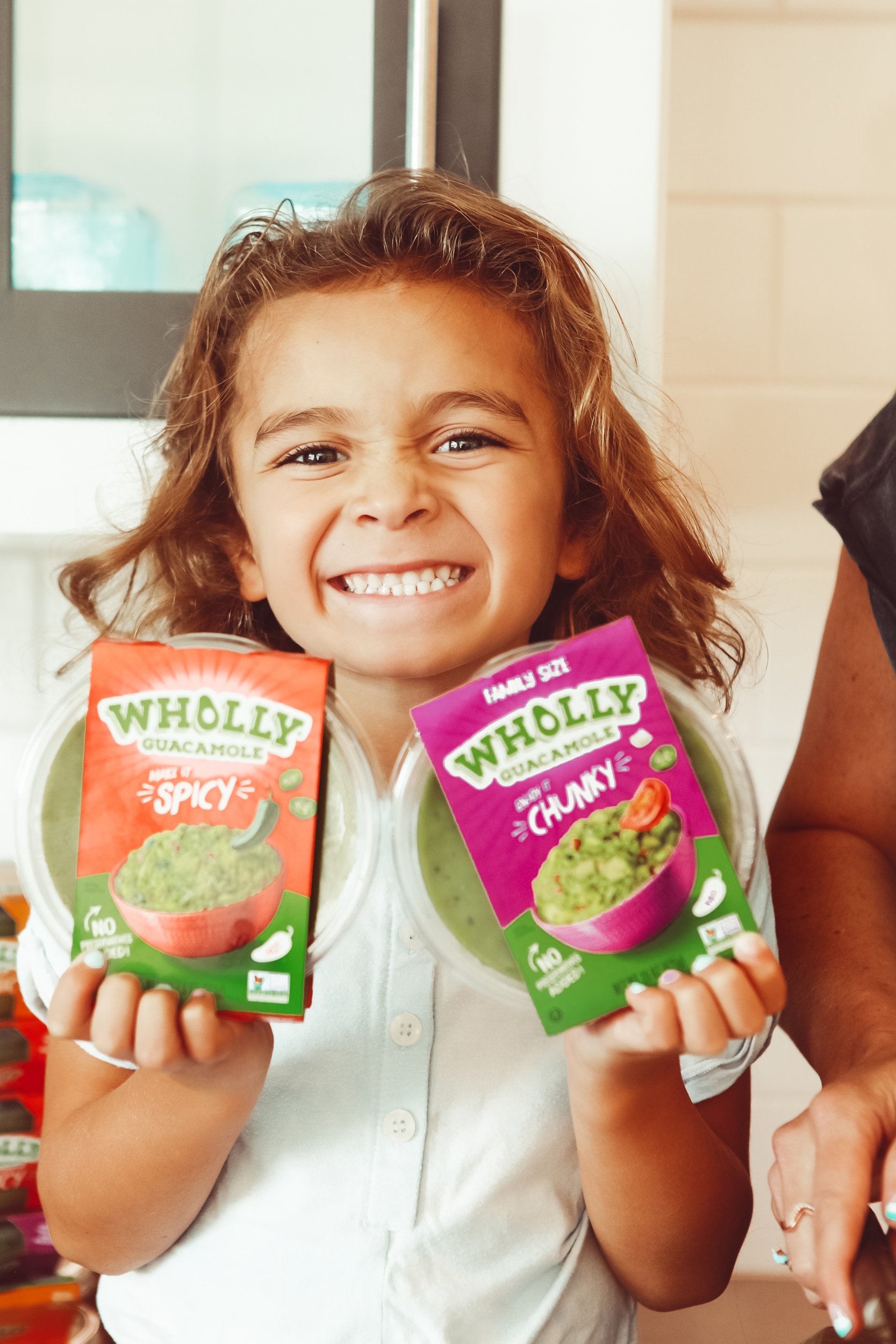 kid smiling with guacamole