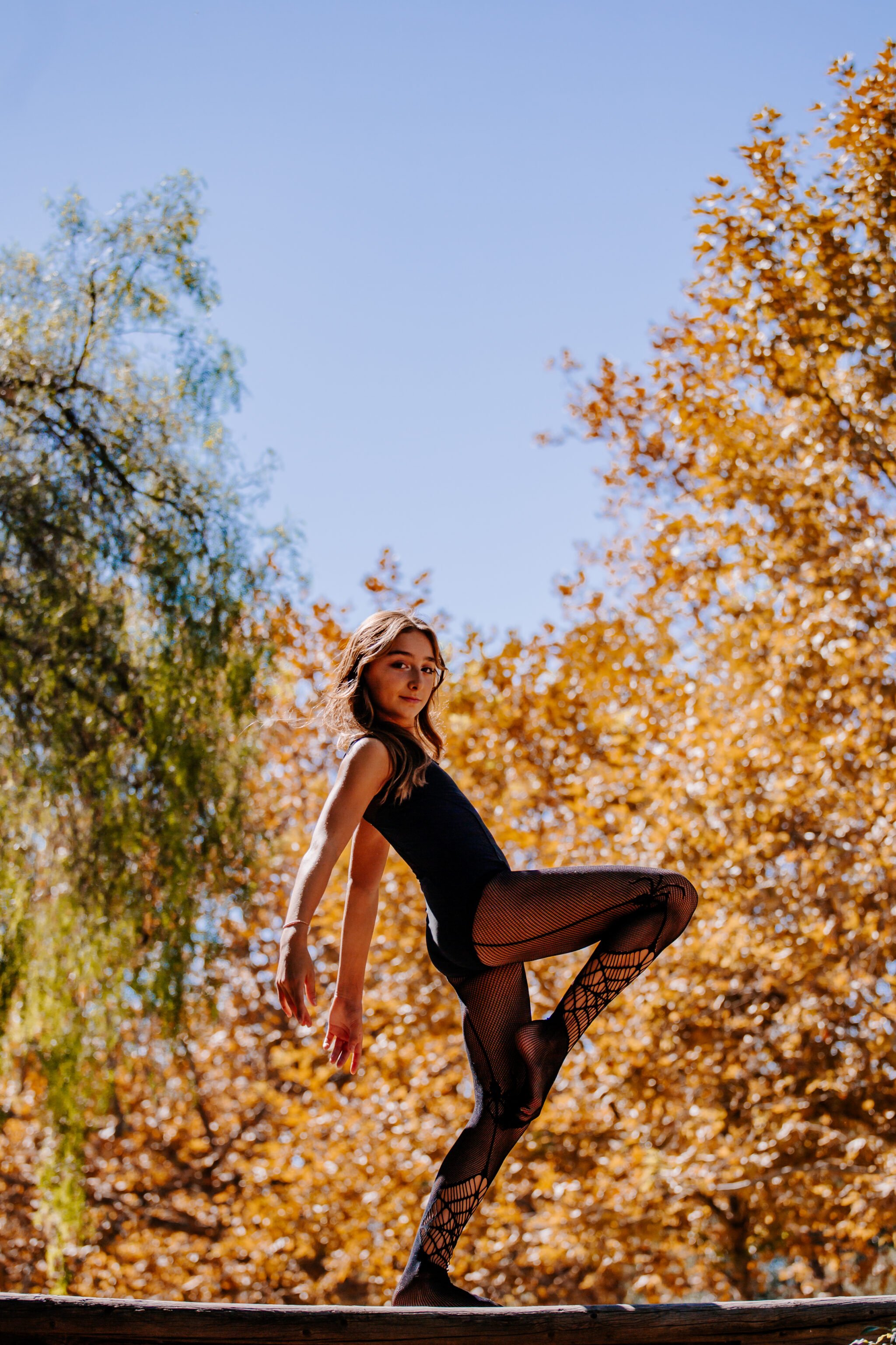 girl dancing in the woods