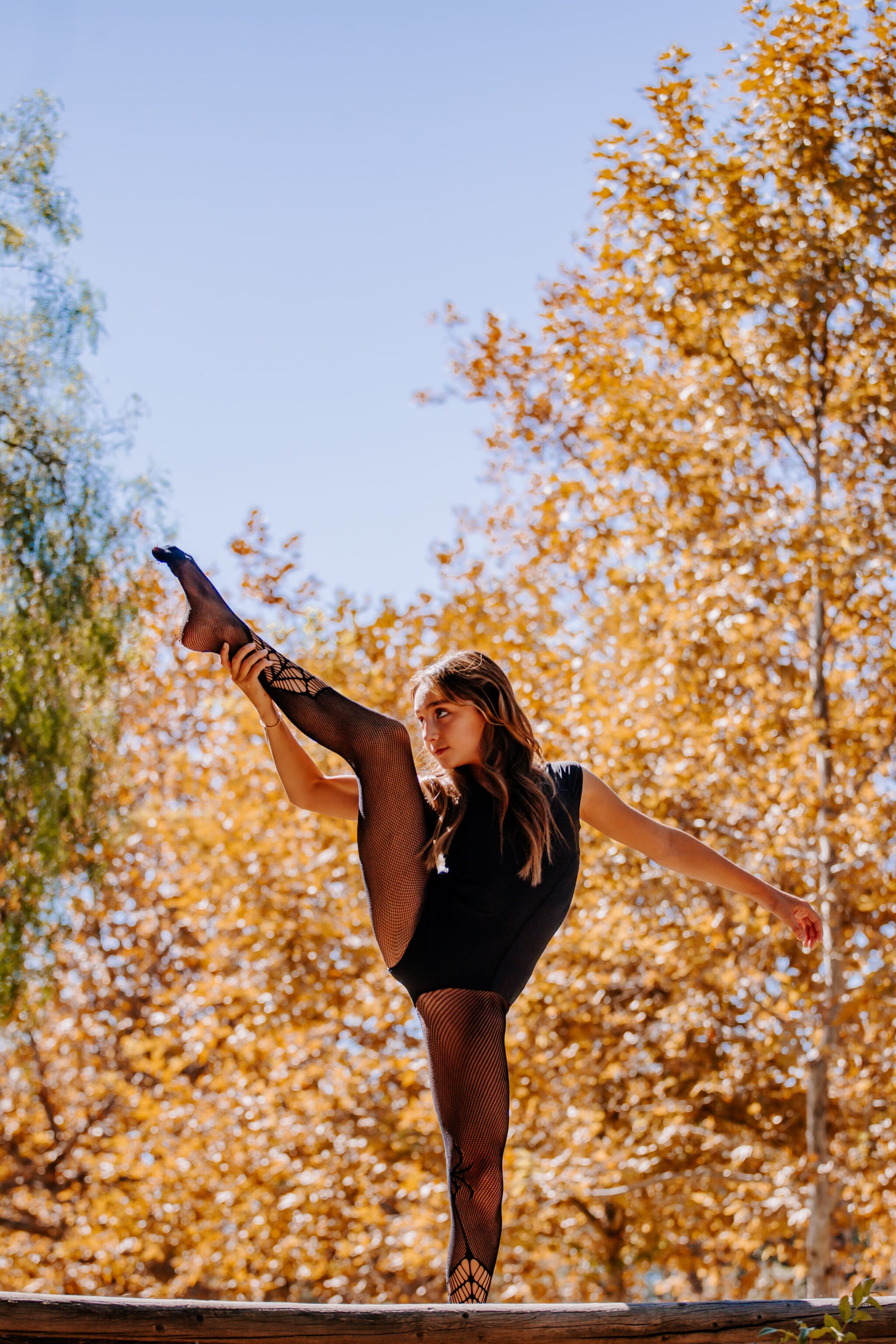 girl dancing in woods