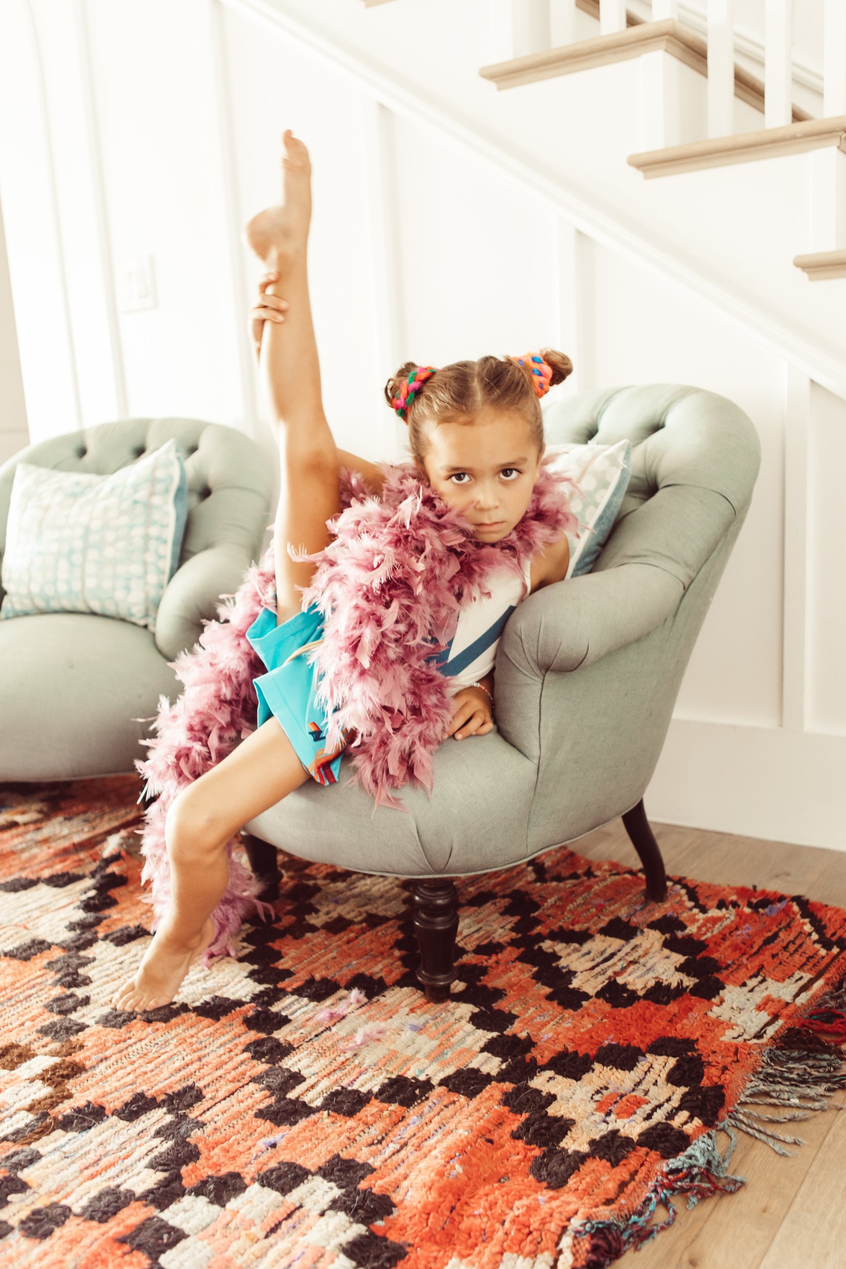 kid dancing on chair