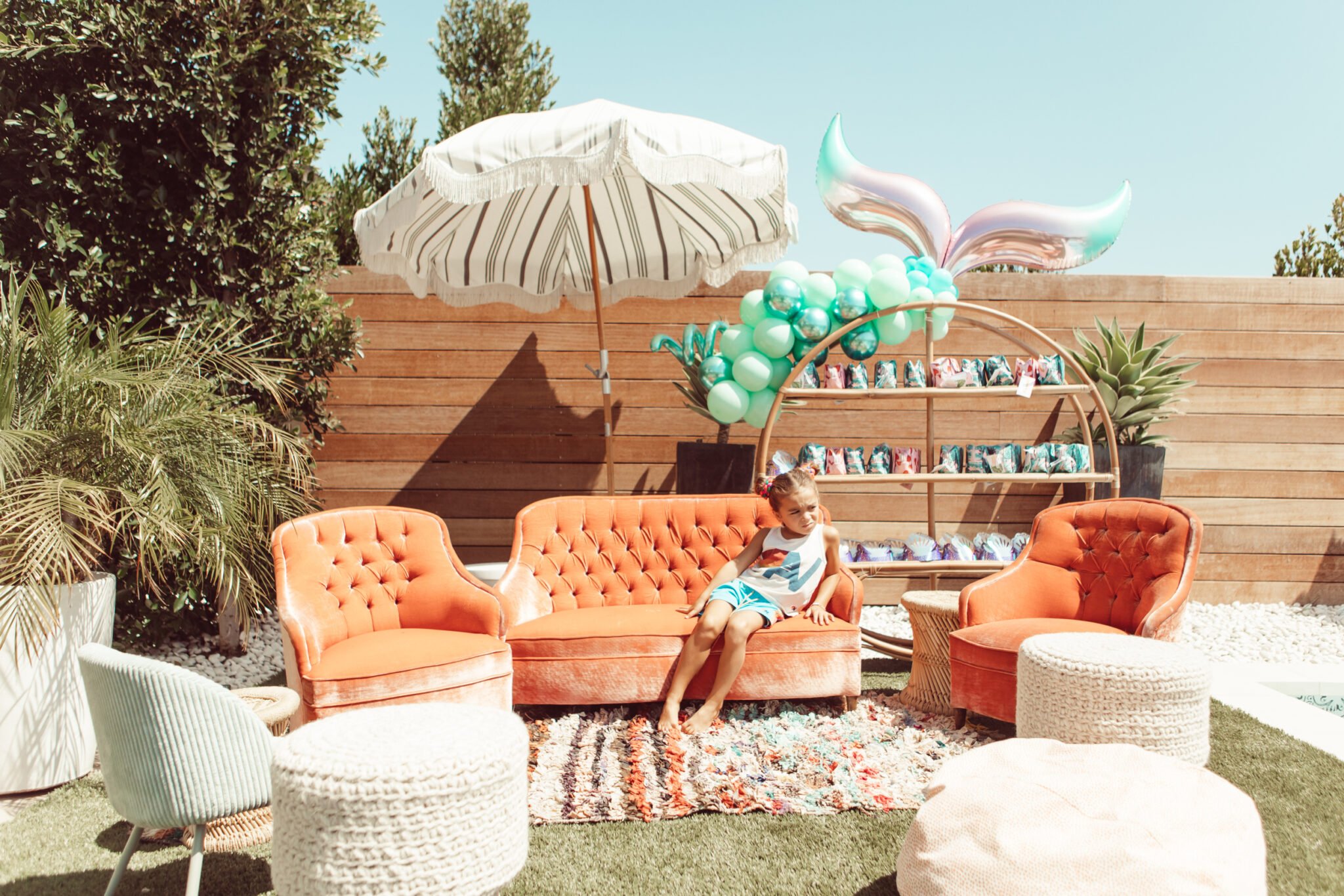 boy relaxing on outdoor couch