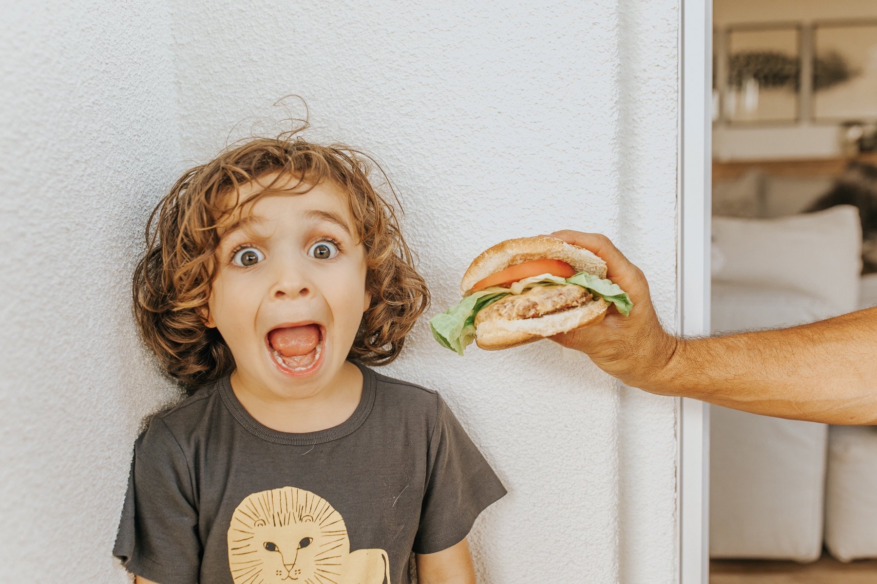 kid with a burger