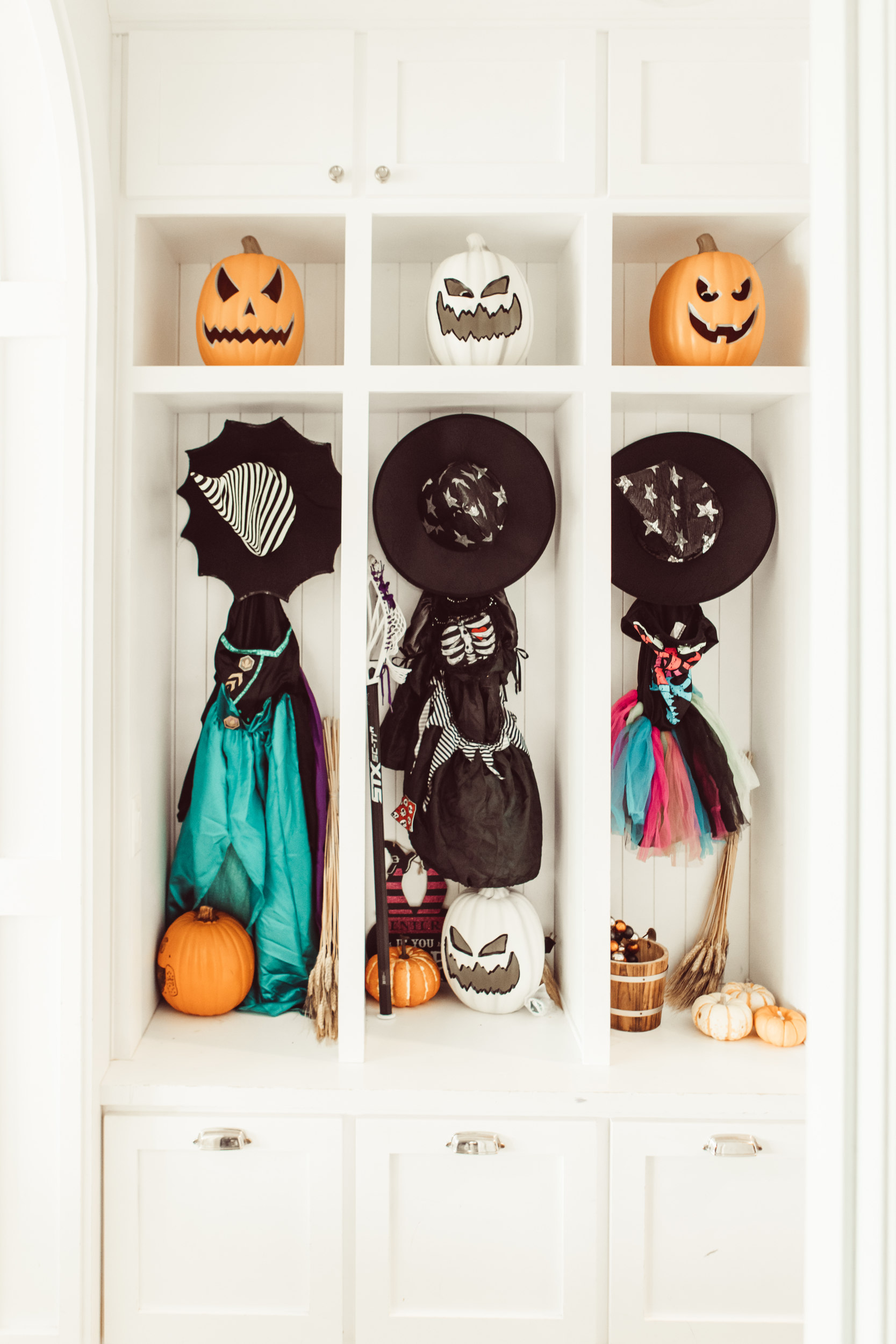 costumes hanging in cupboards