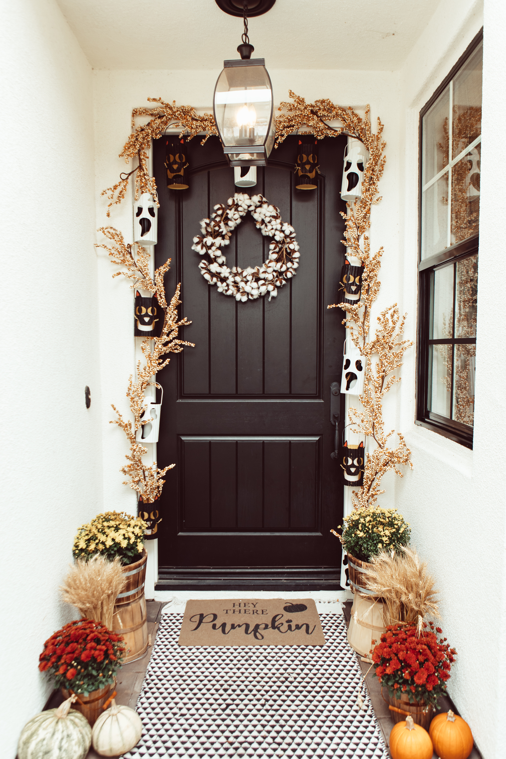 front door decorated for halloween