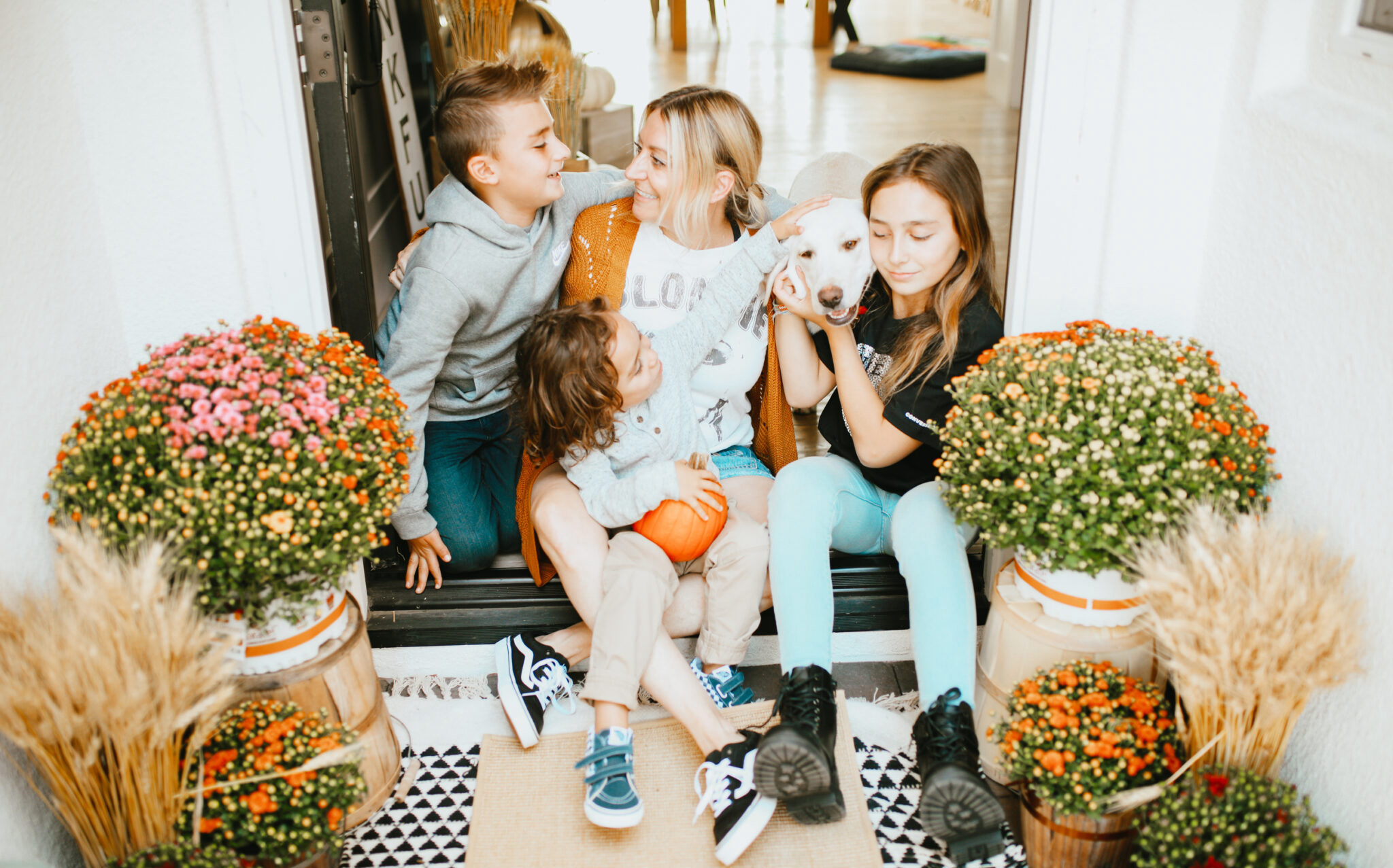 mom with kids on porch