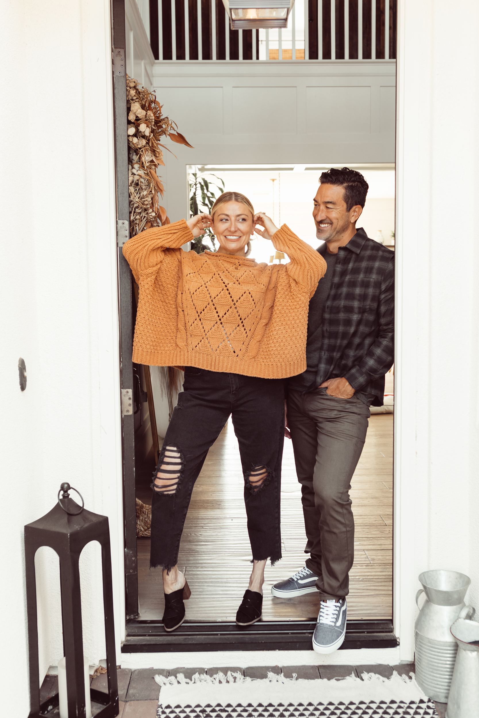 couple standing in doorway