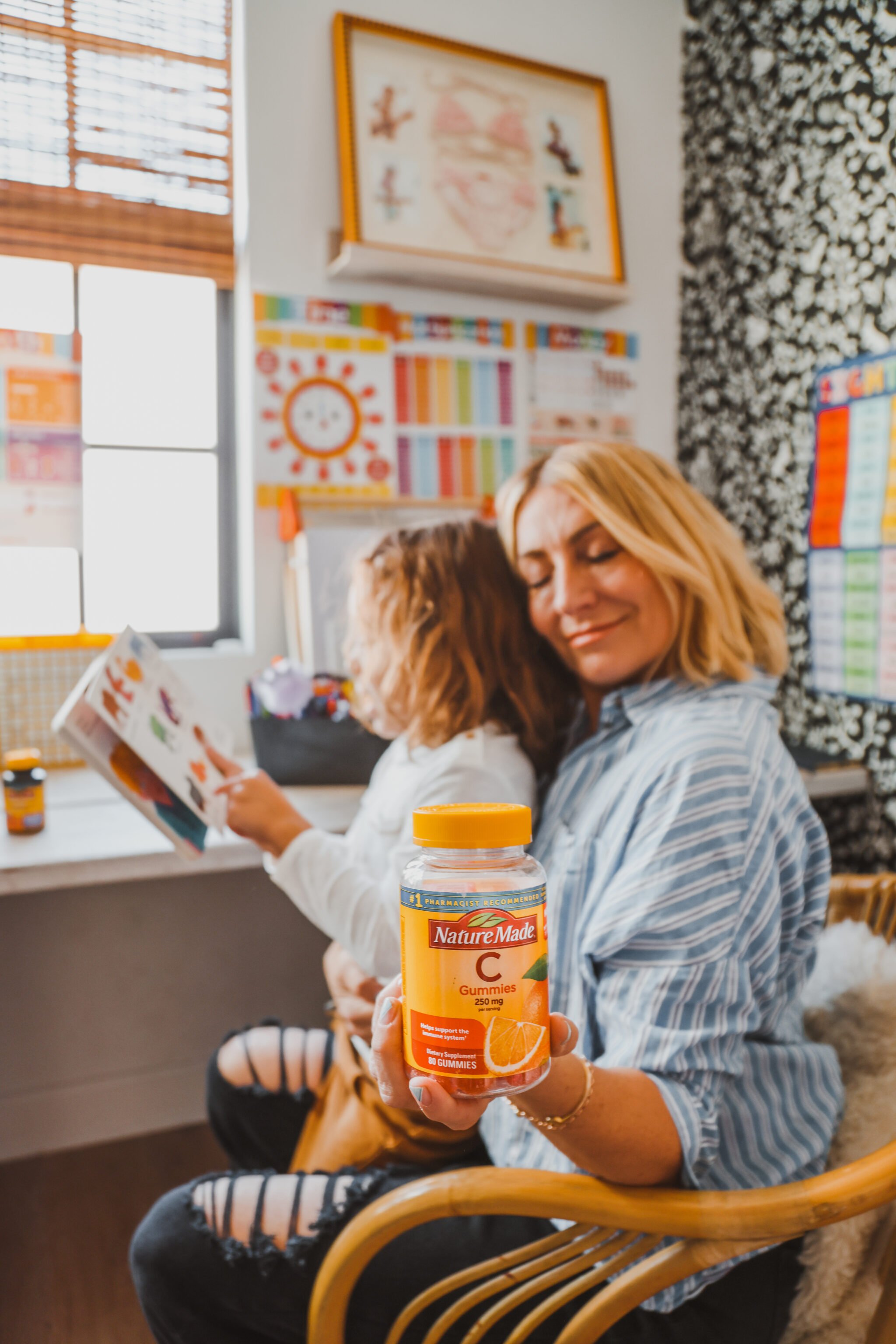 mom holding multivitamins