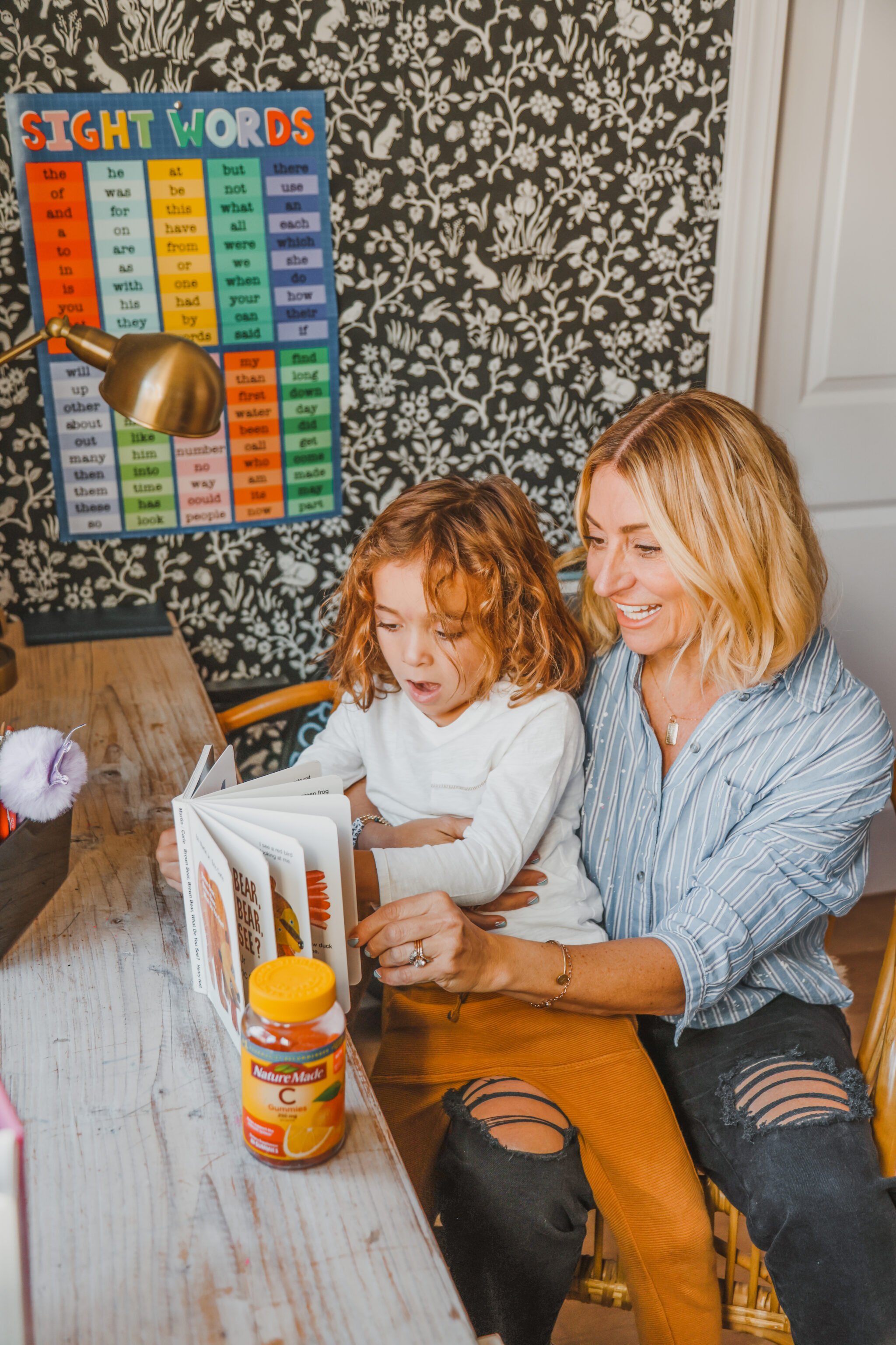 mom and son reading book