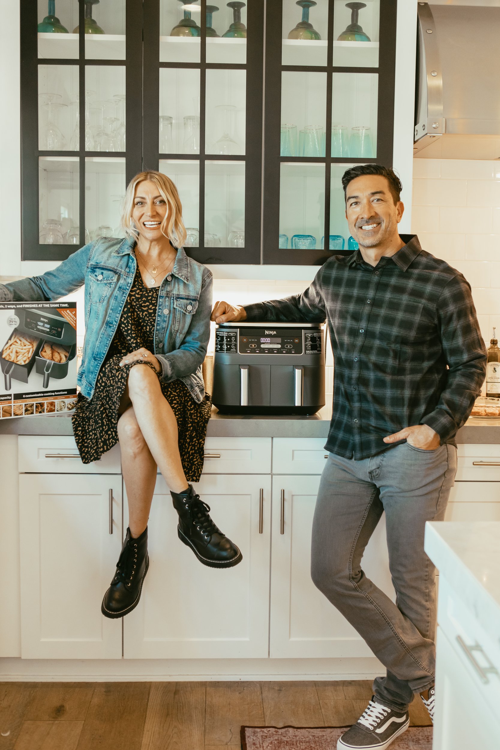 couple in kitchen with a new air fryer