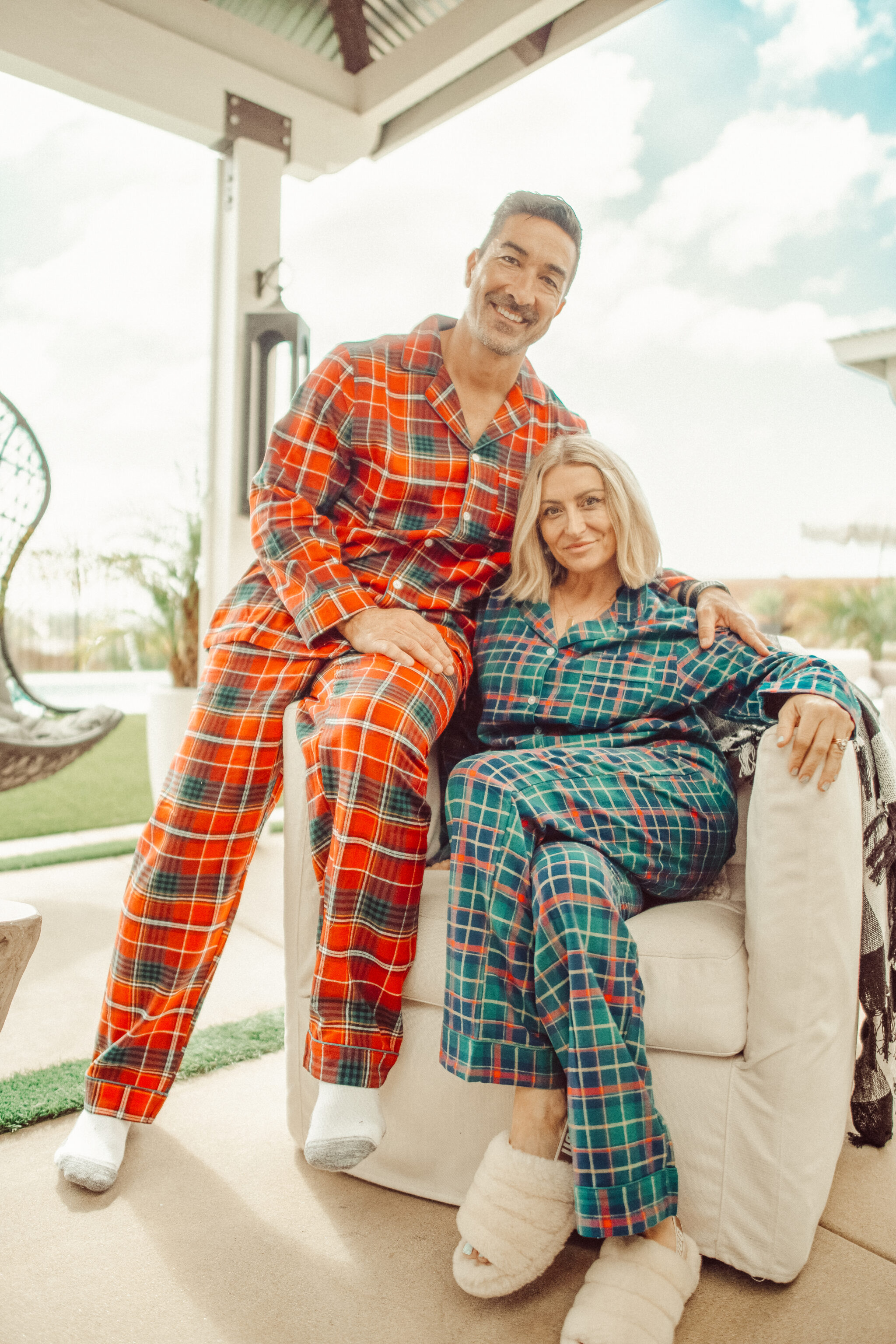 couple sitting together in pajamas