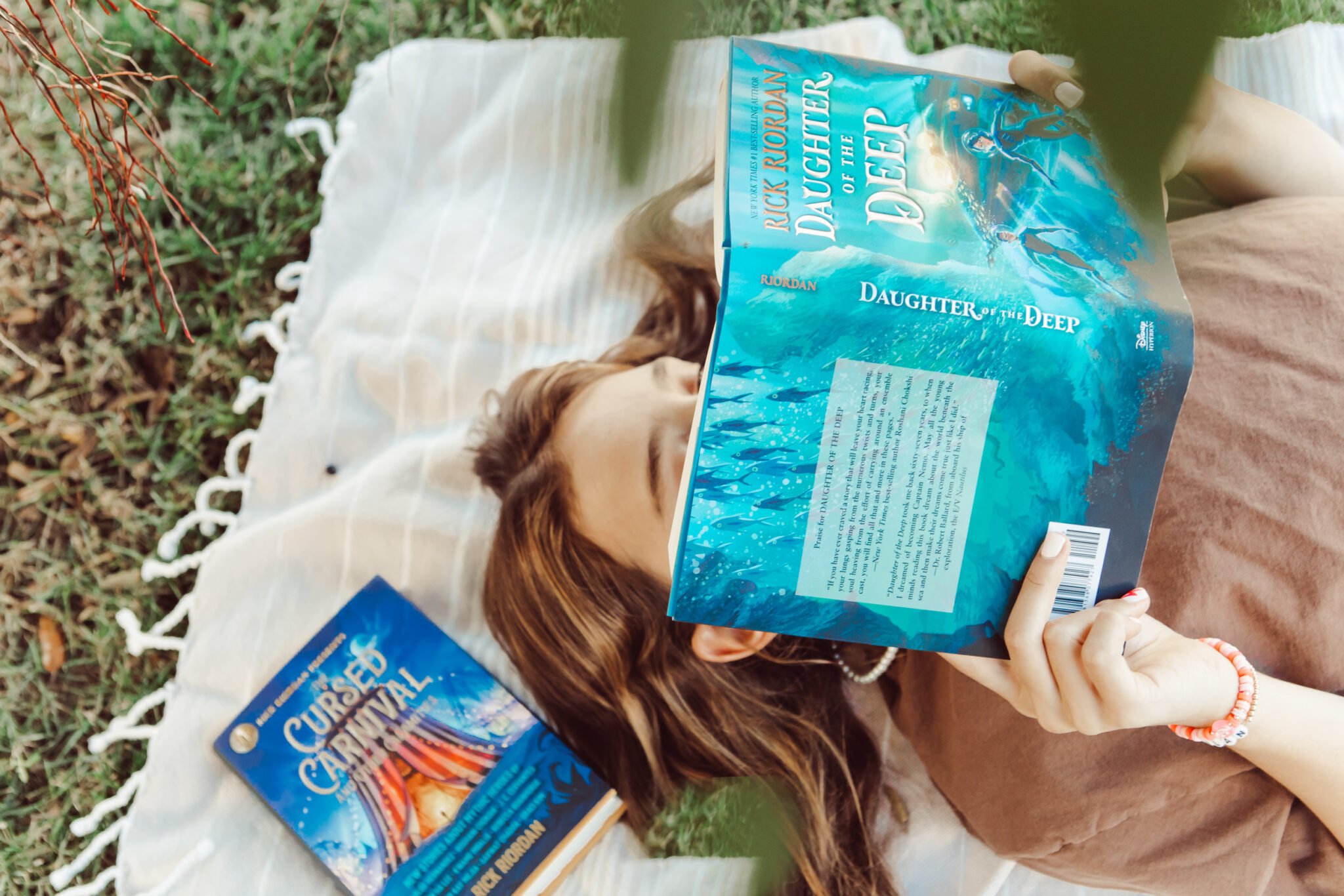 girl lying down reading