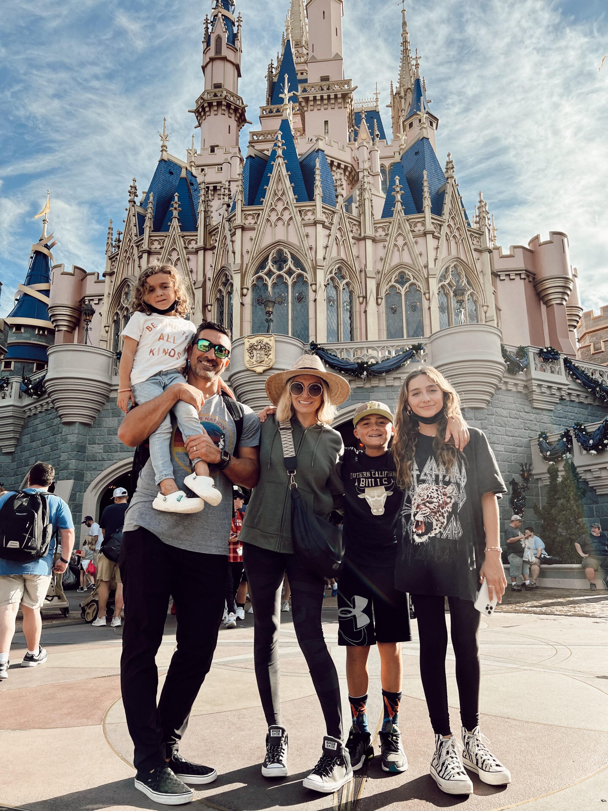 family at walt disney world castle