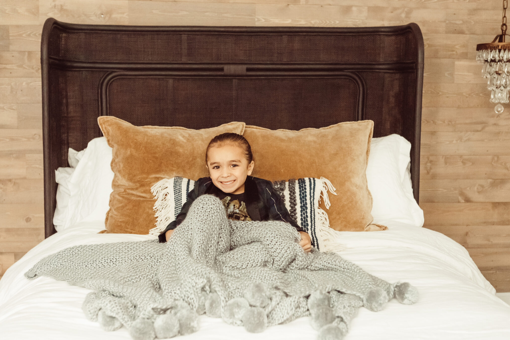 boy sitting in bed