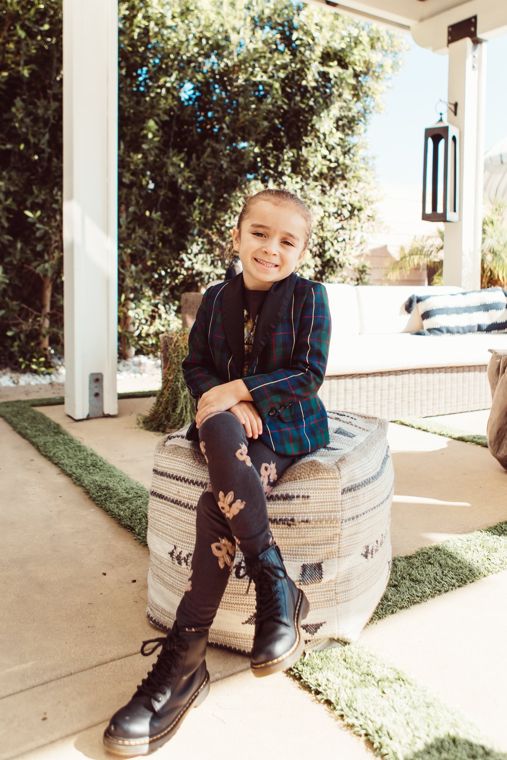 boy sitting on patio