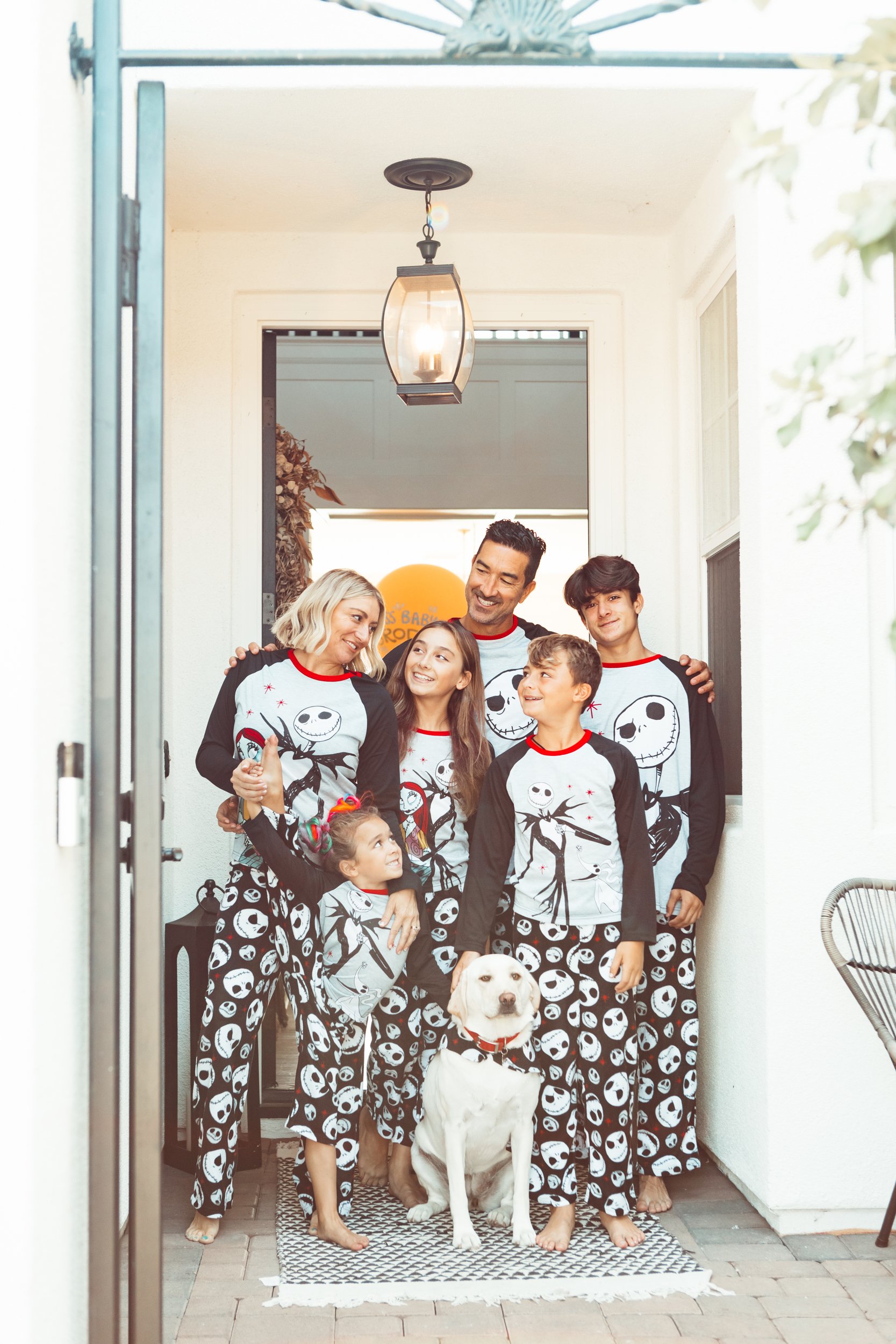 family in matching holiday pajamas