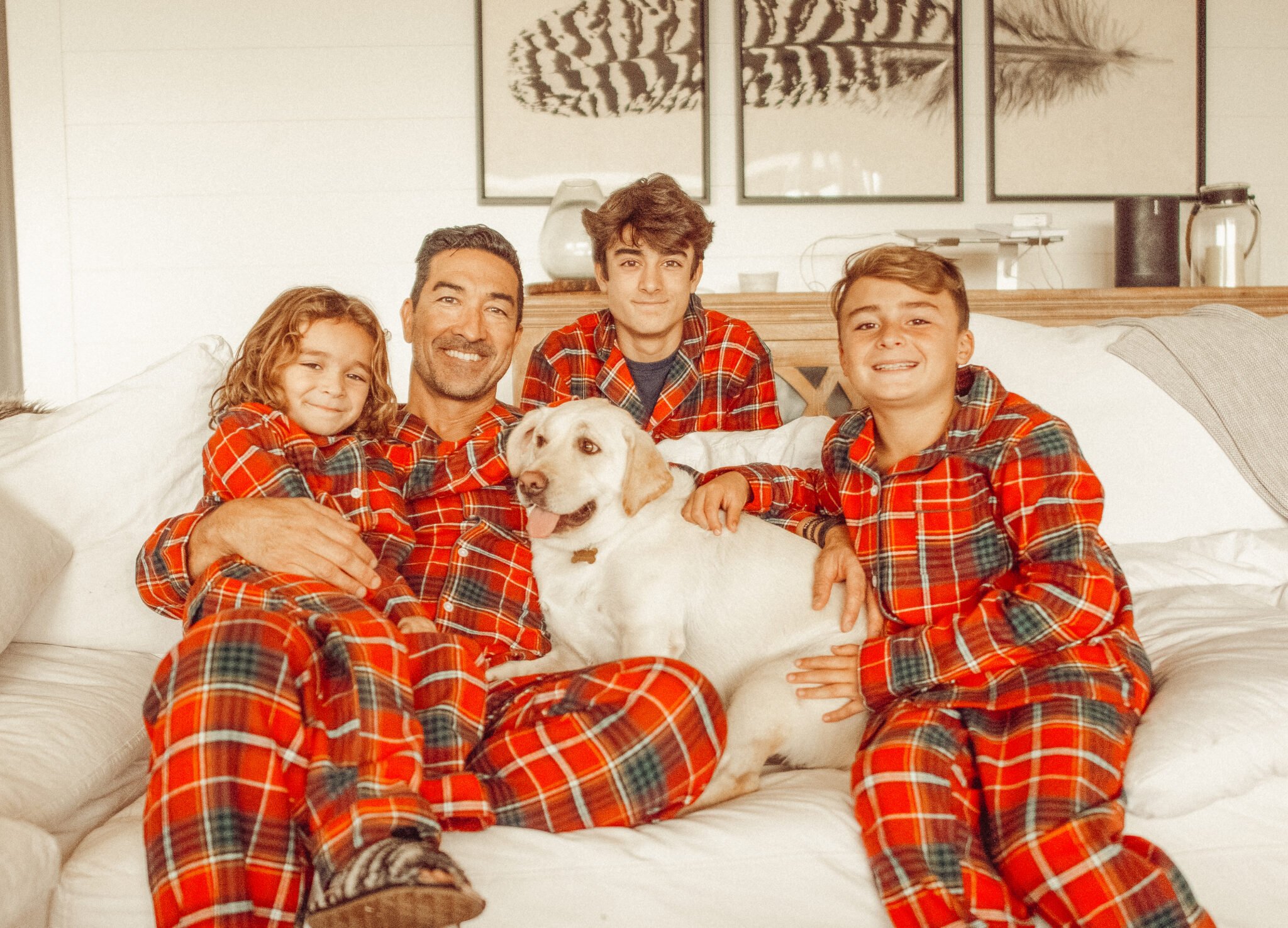 dad with sons and dog