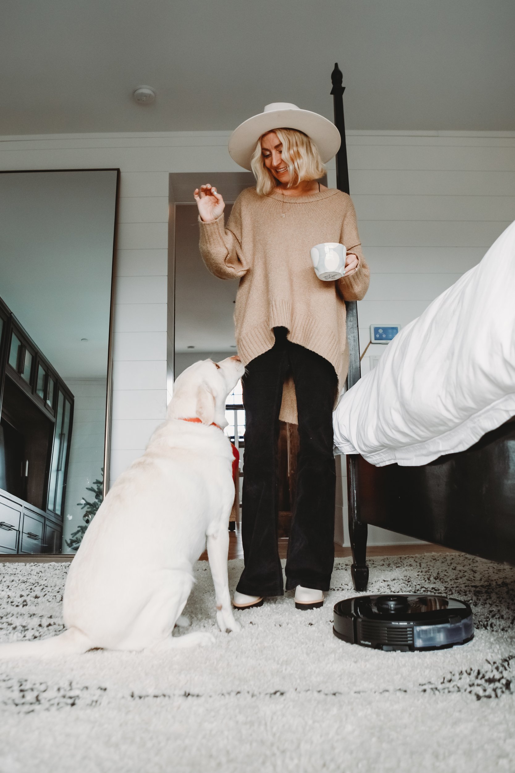 woman standing with her dog