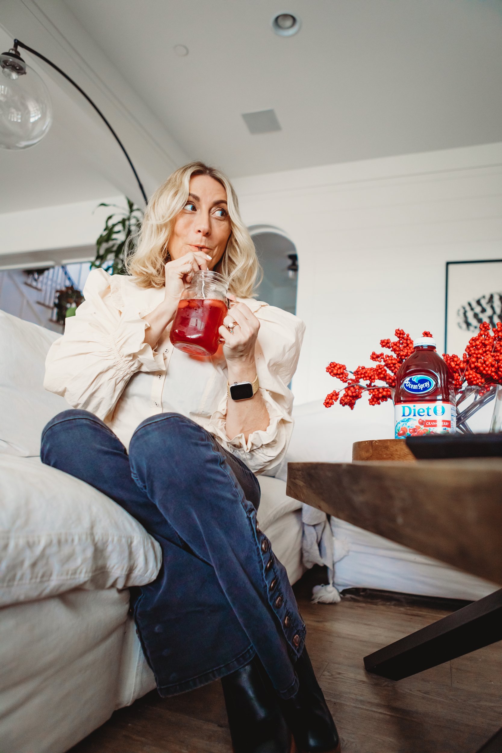 woman drinking cranberry juice