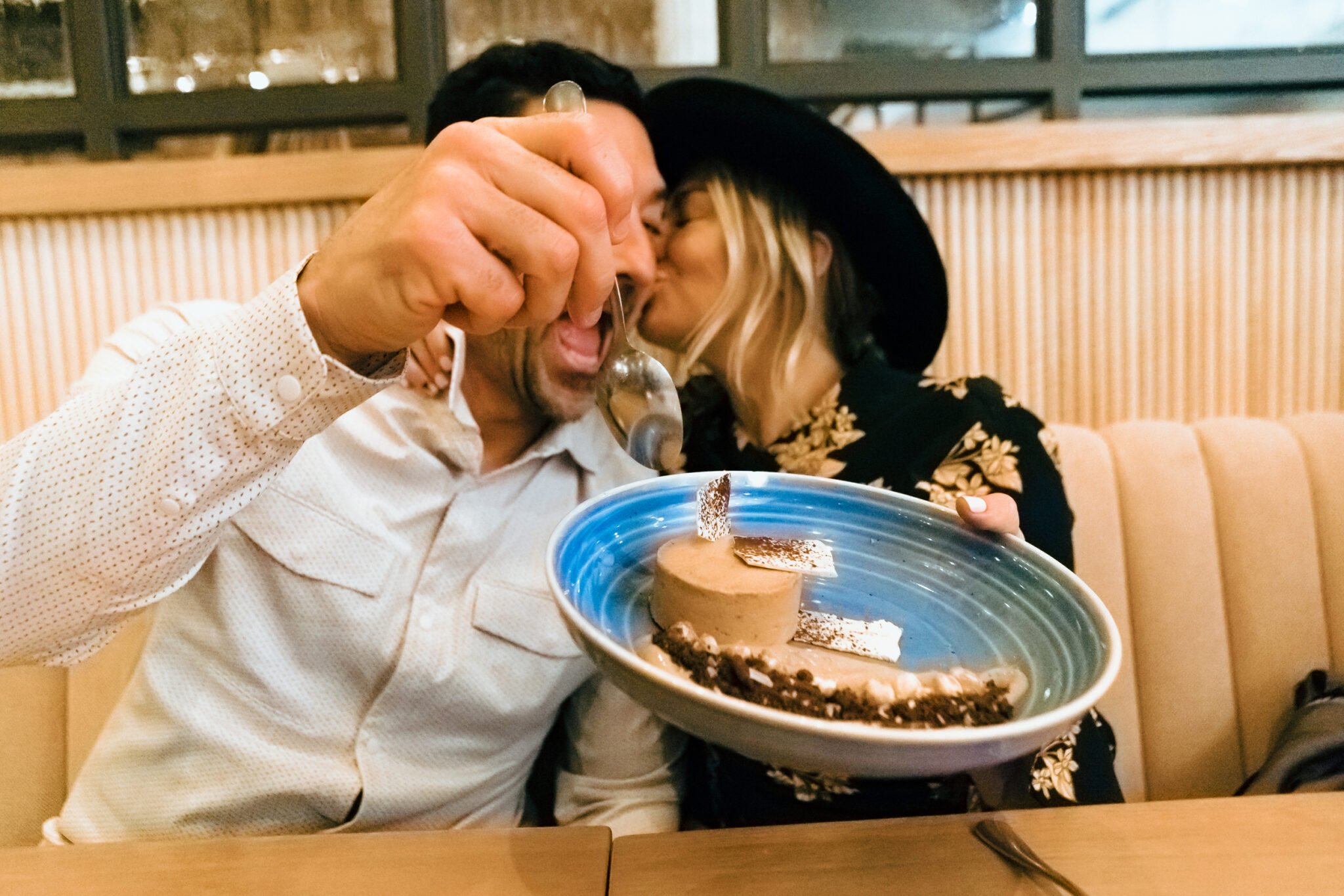 couple sharing dessert on date night