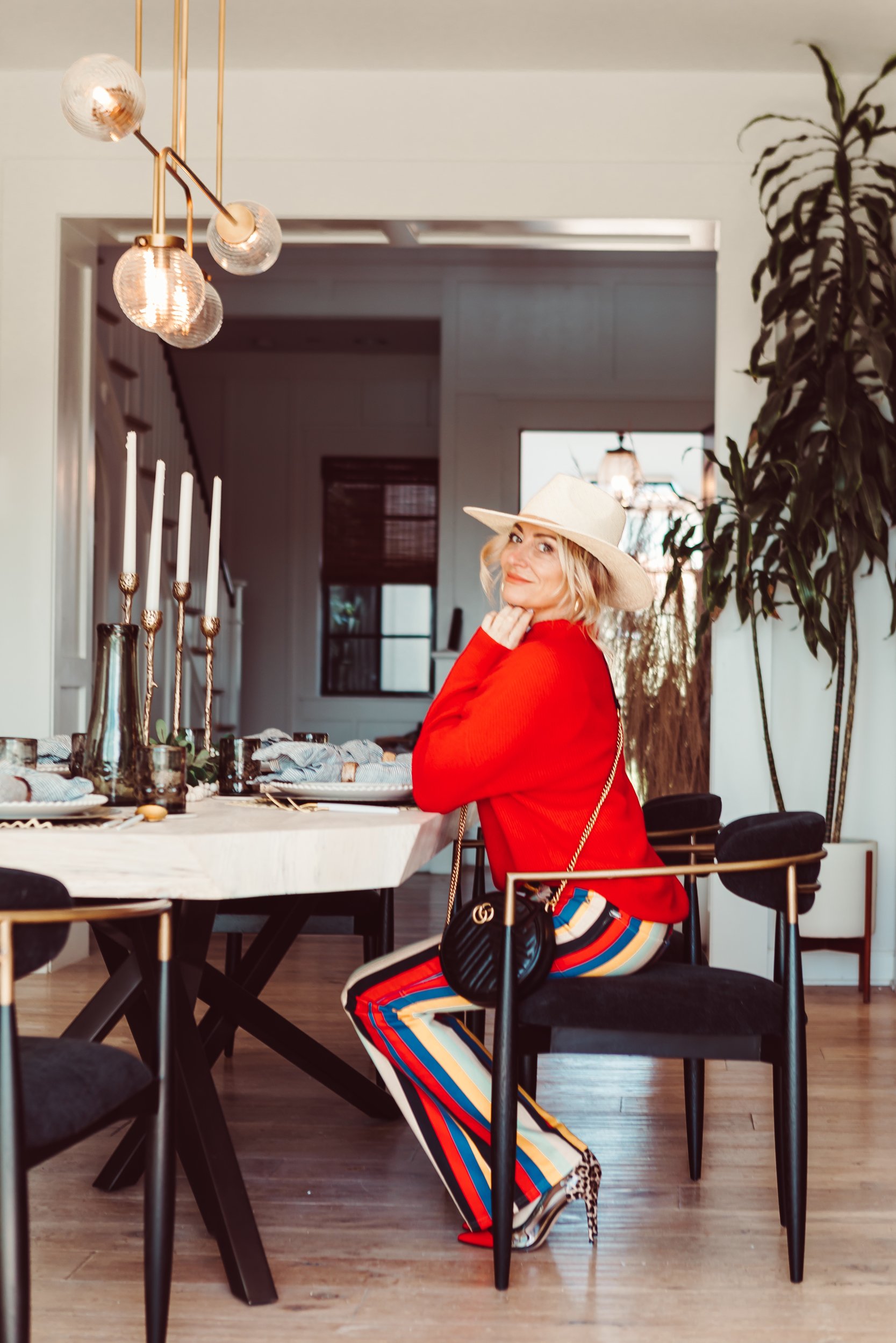 woman sitting at dining table