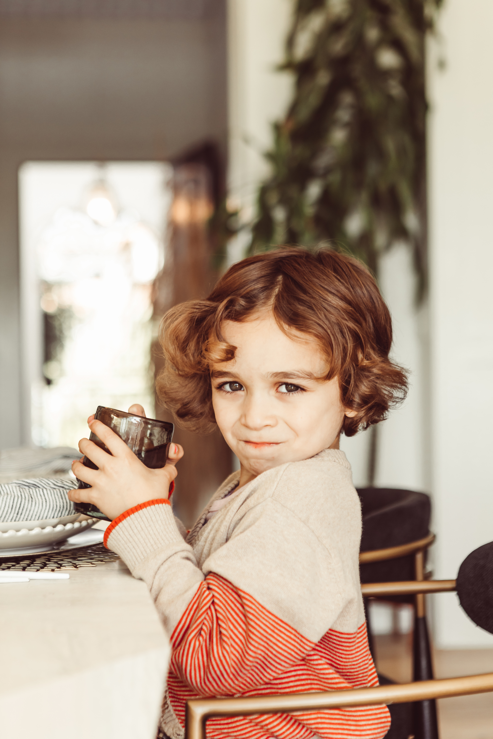 boy holding a cup