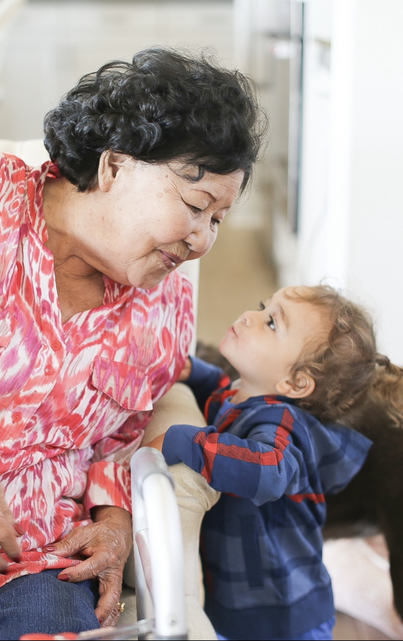 grandma kissing grandson