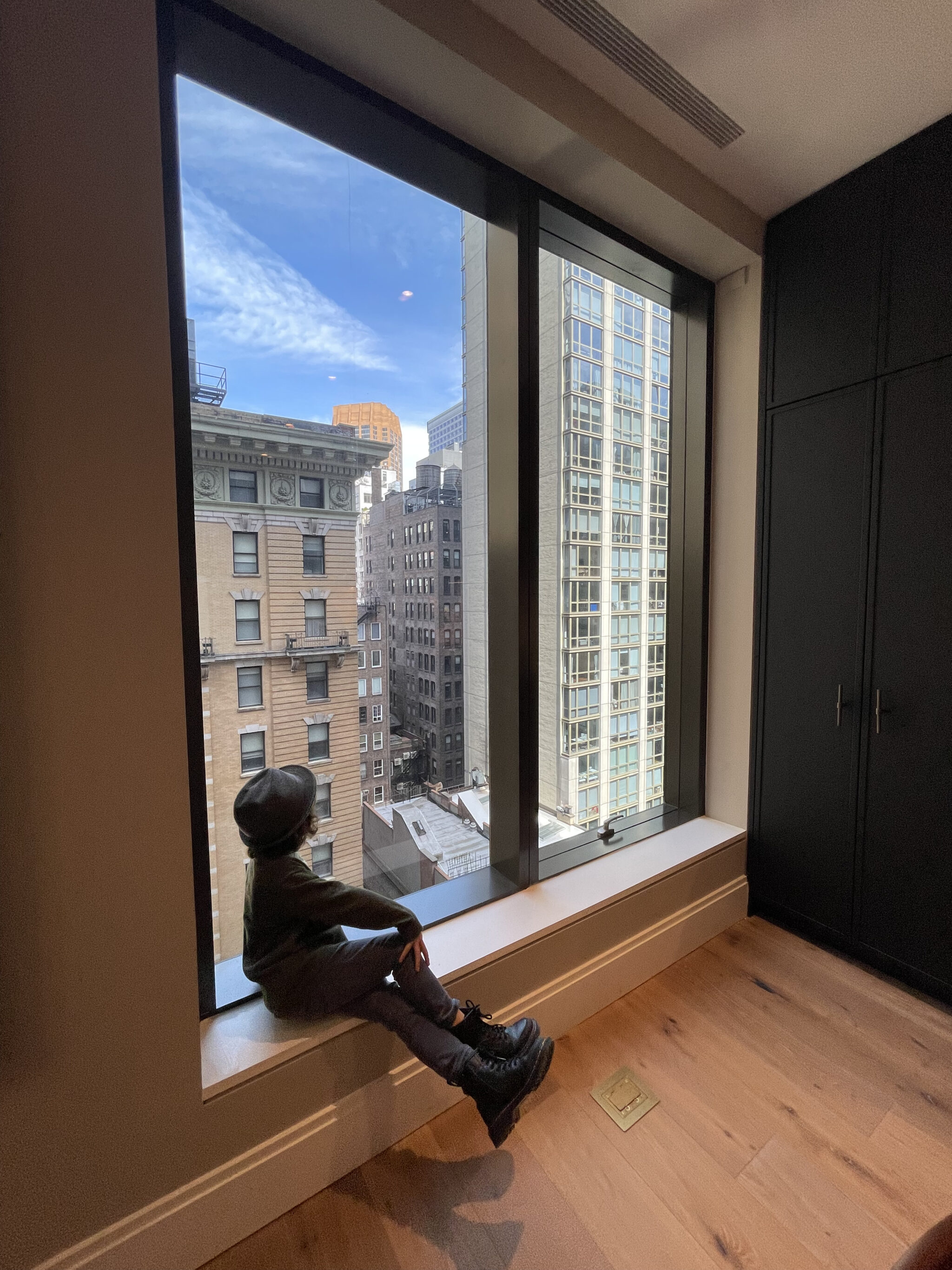 boy looking out the window