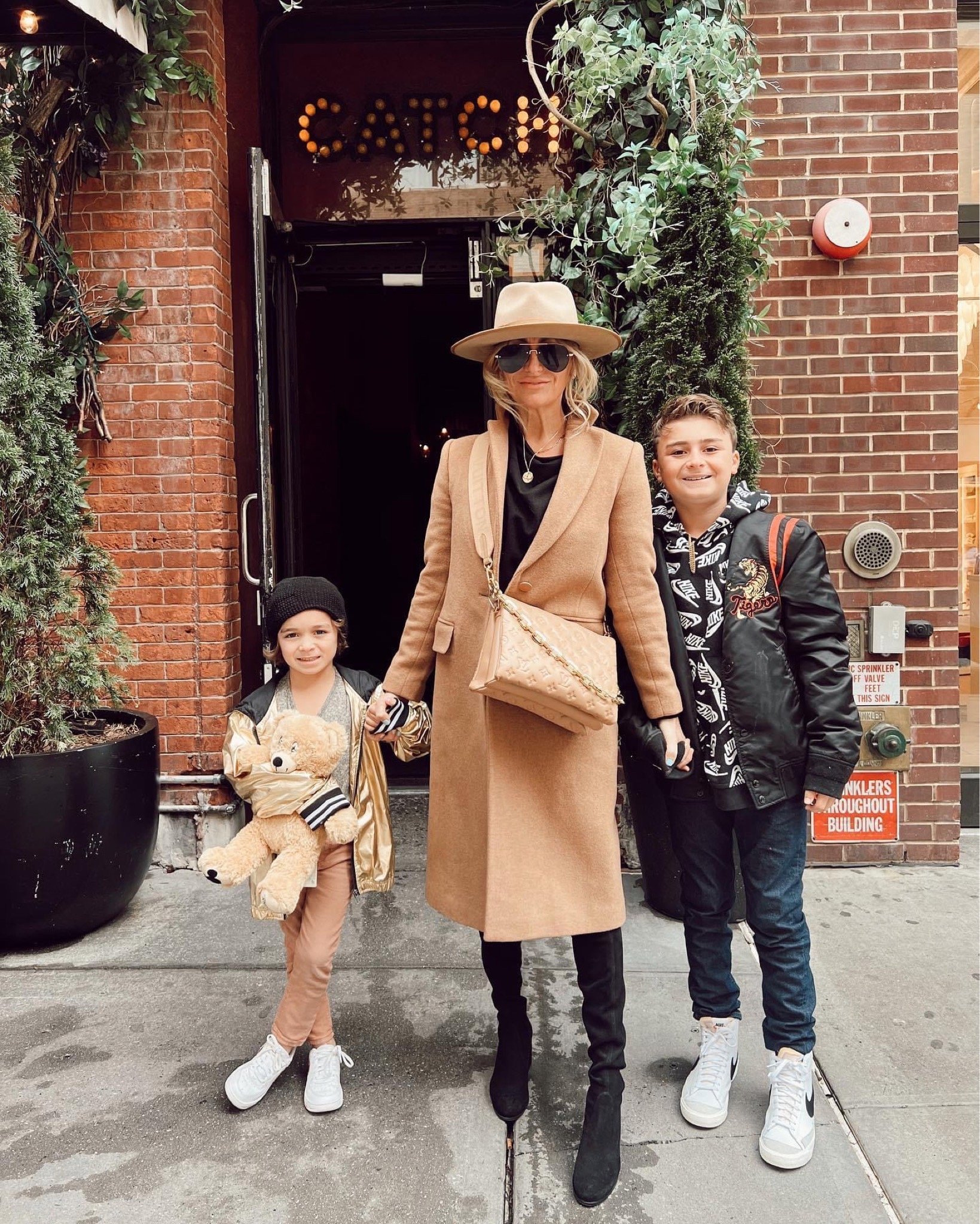 mom and her kids in new york city in style