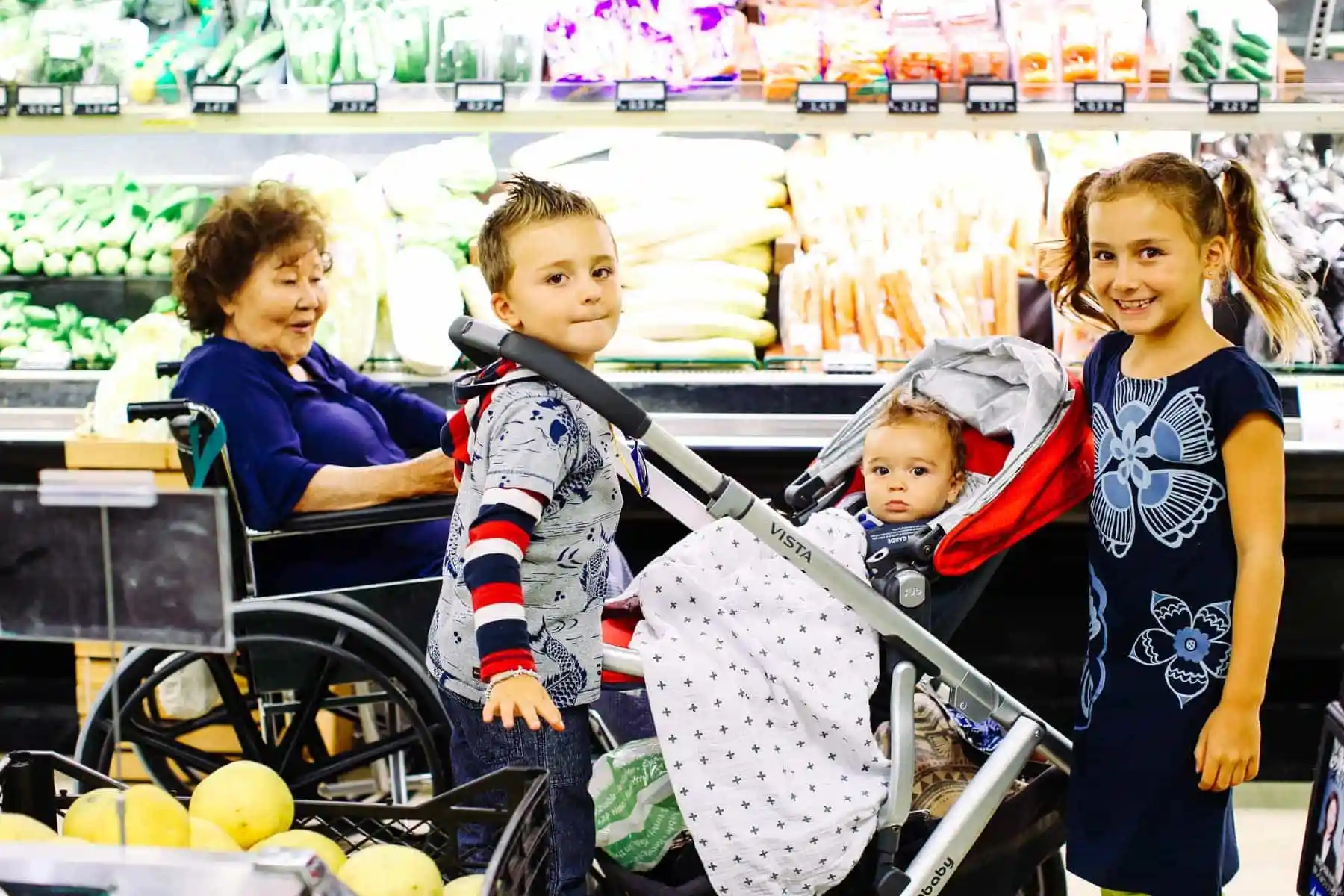 grandma with her grandchildren at the supermarket
