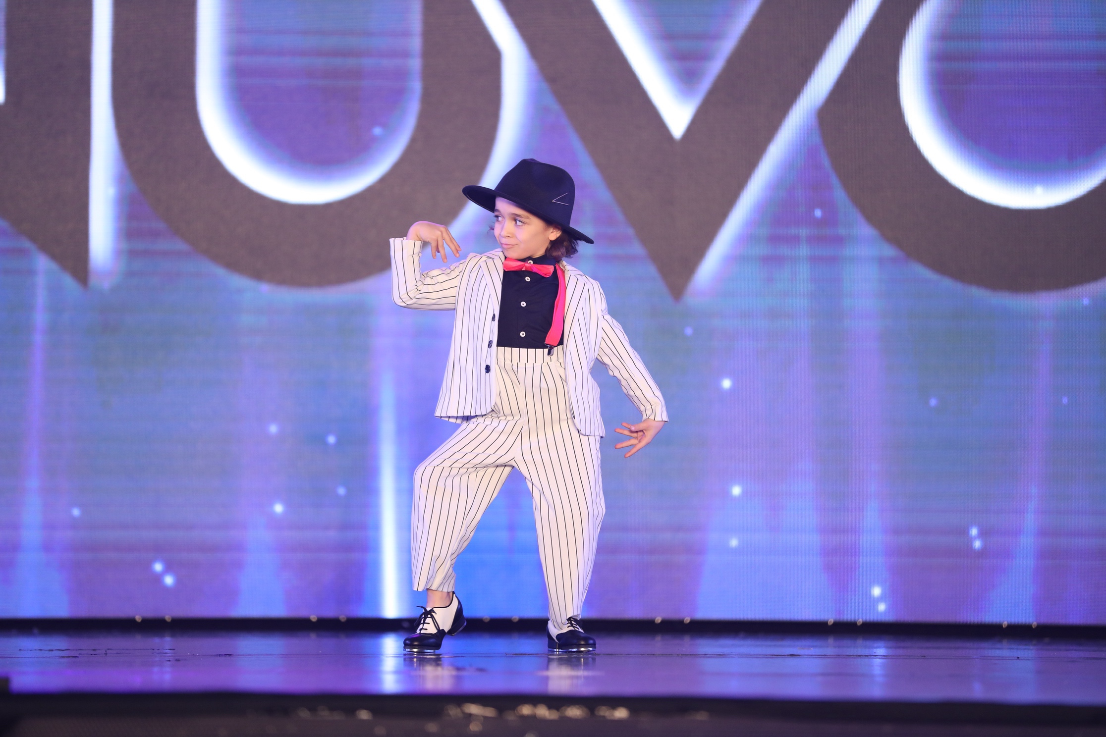 boy dancing on stage