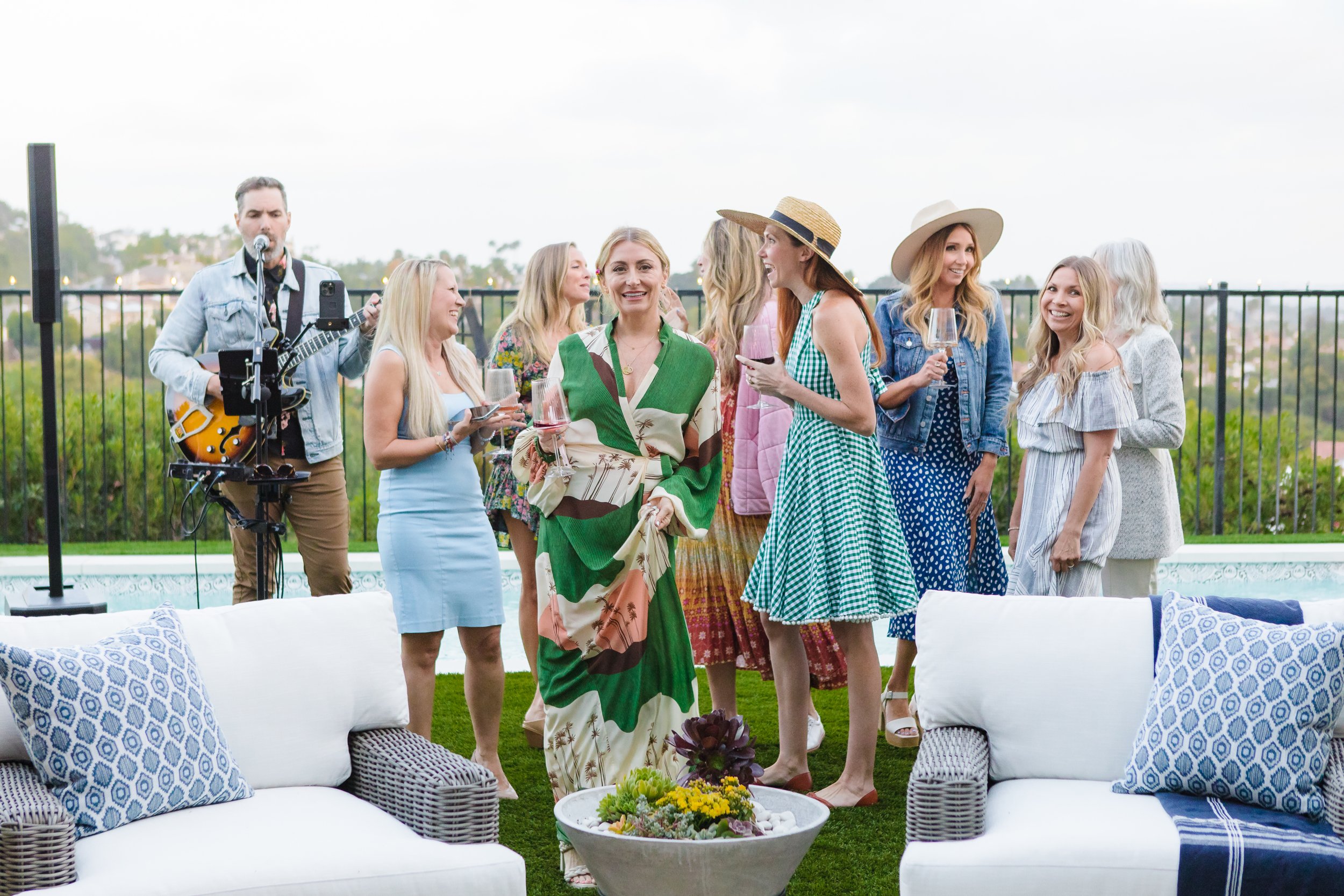 women standing outside at party