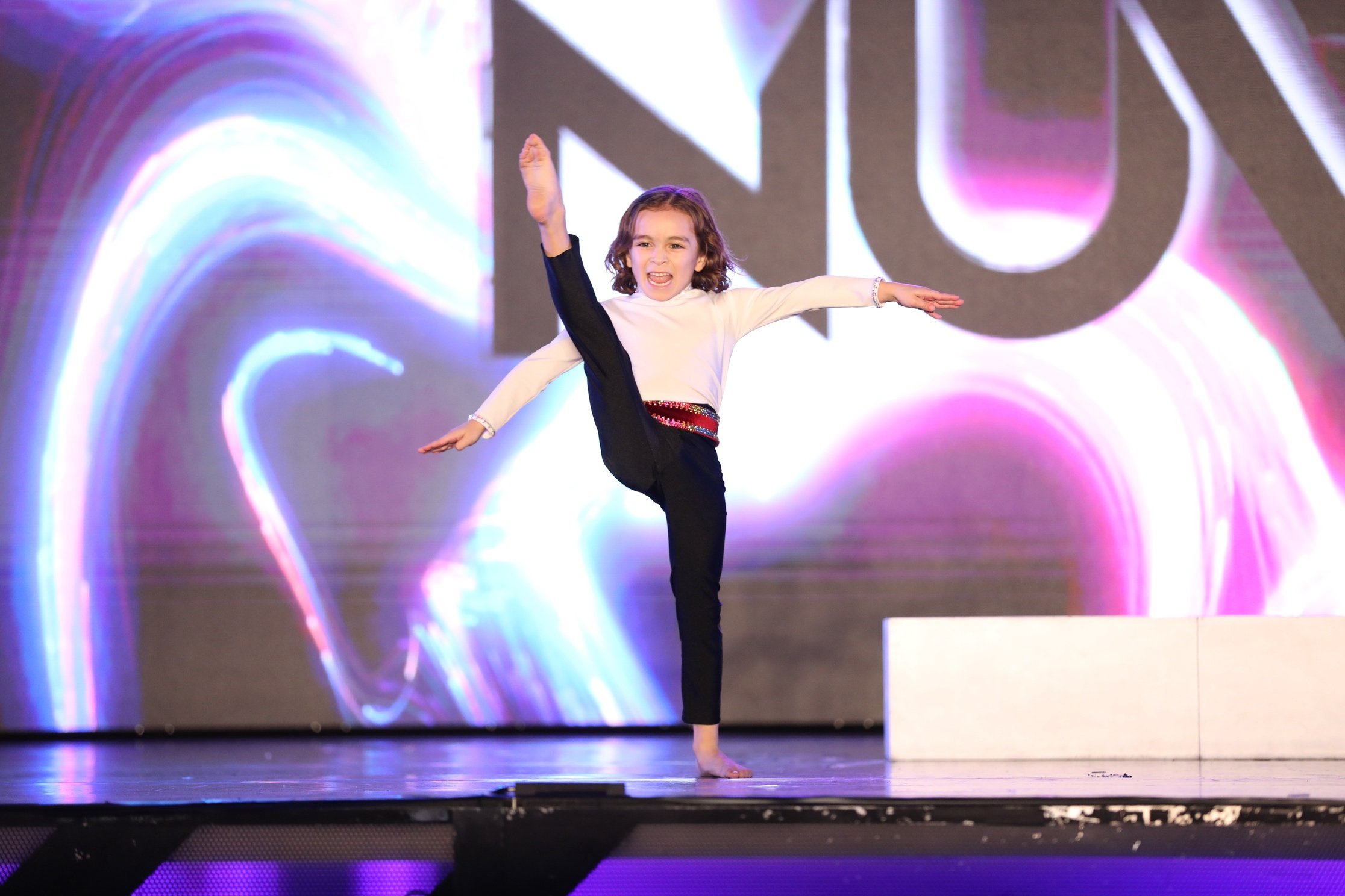 boy dancing on stage