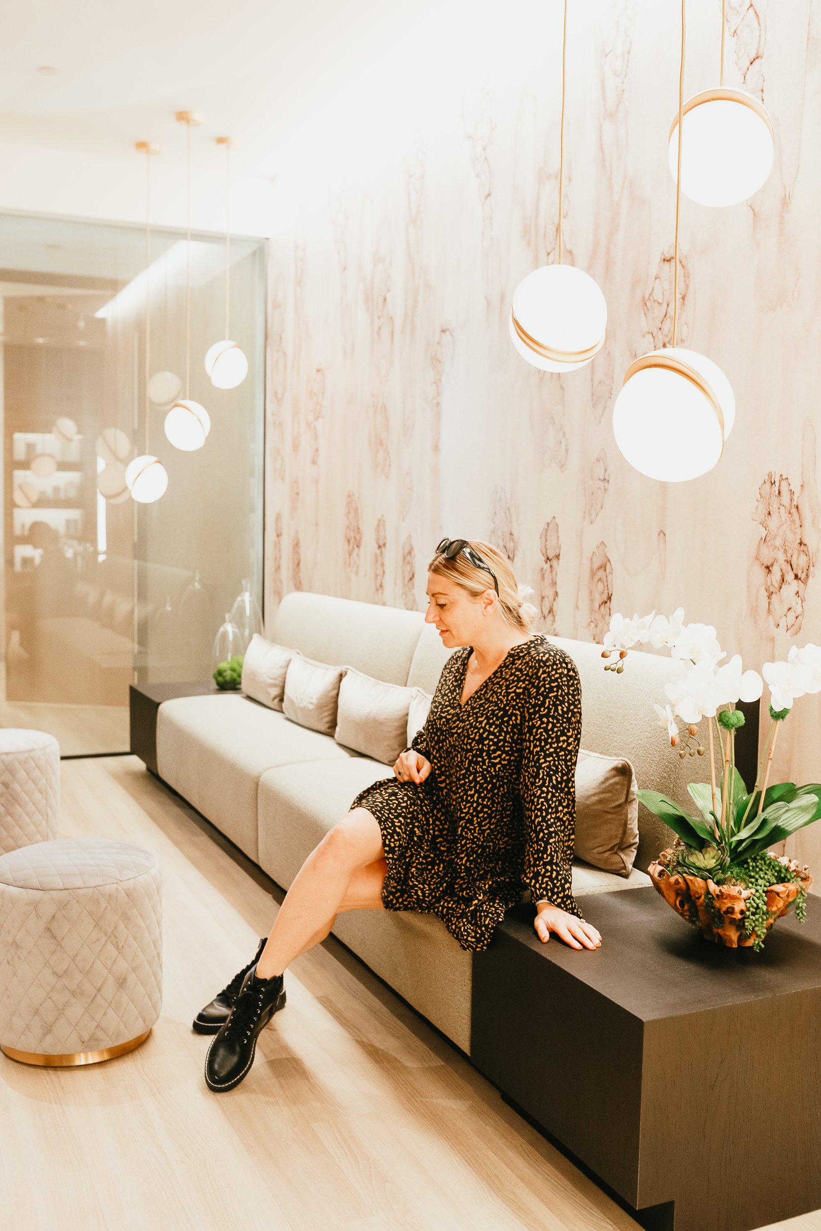 woman sitting in a spa