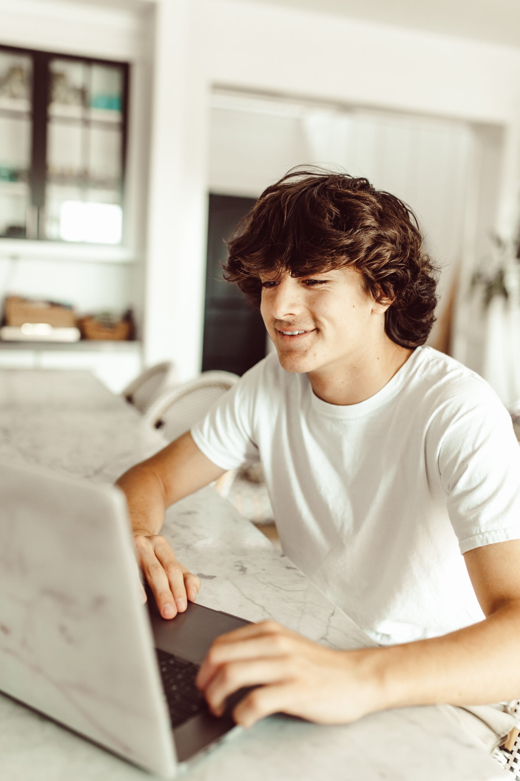 teen on computer