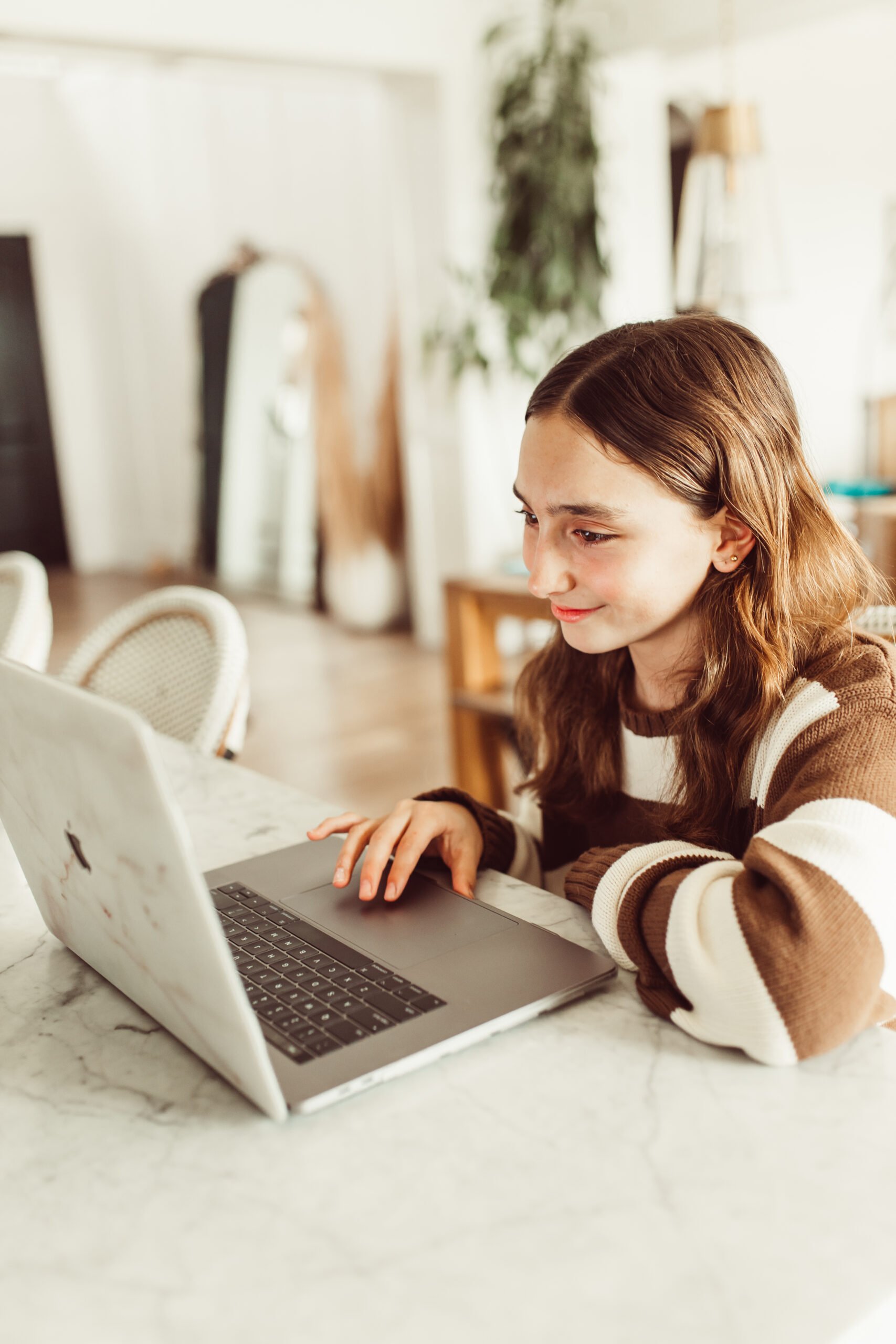 girl working on laptop