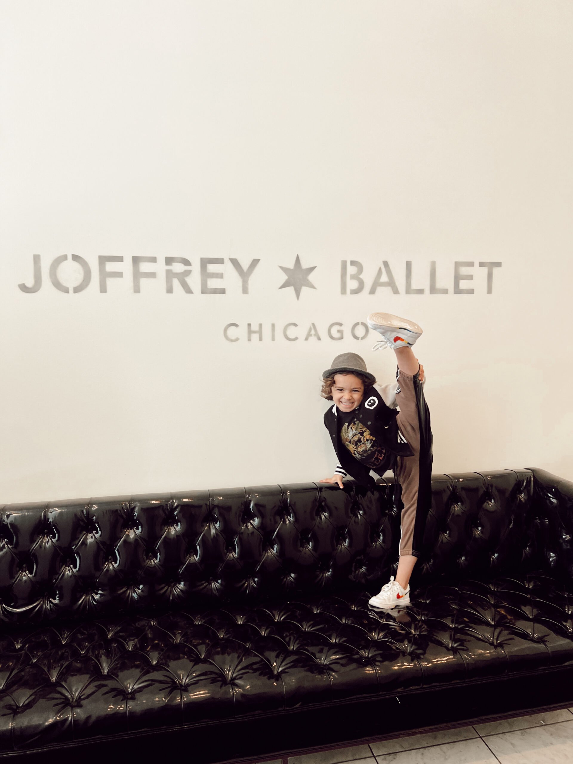 boy dancing on couch