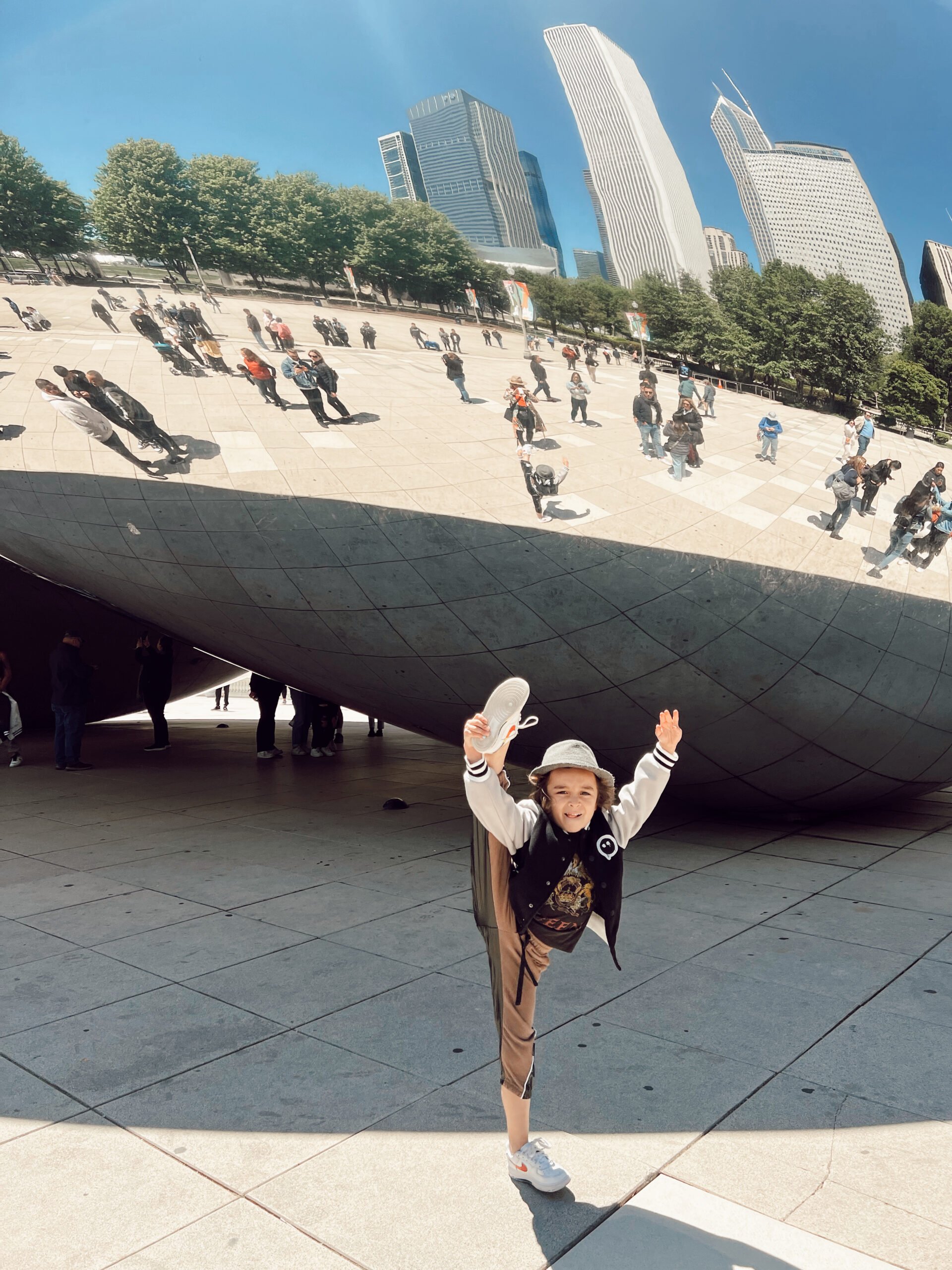 boy dancing at the bean in chicago