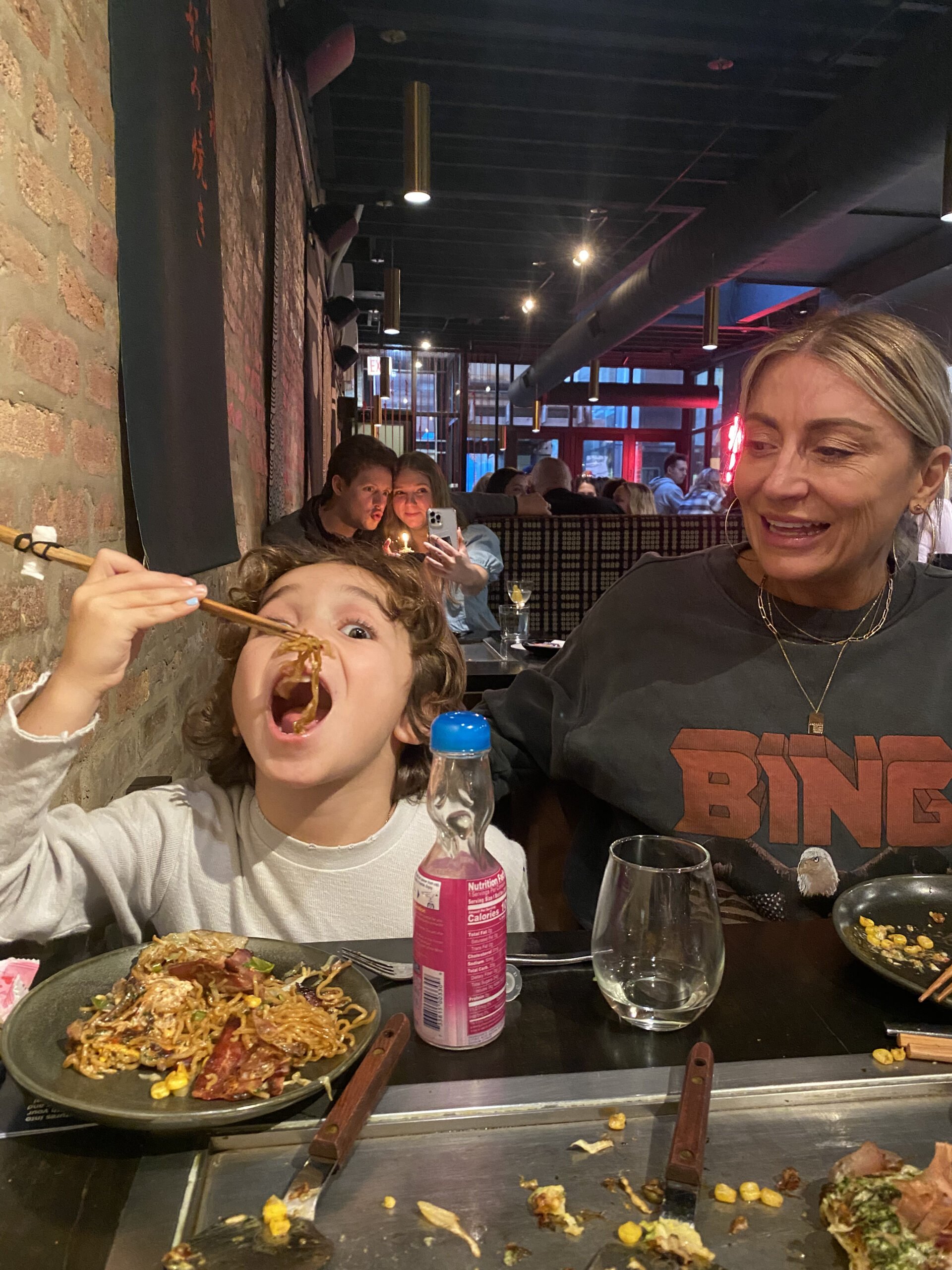 boy eating noodles