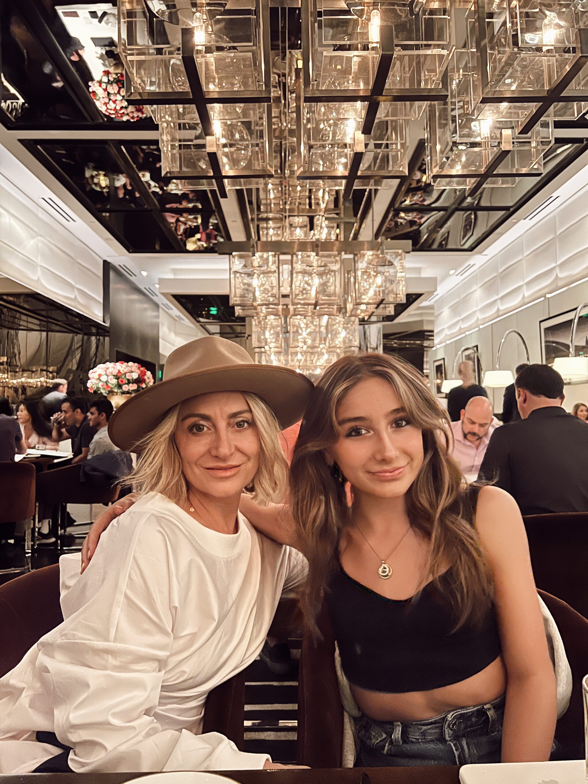 mom and daughter in restaurant