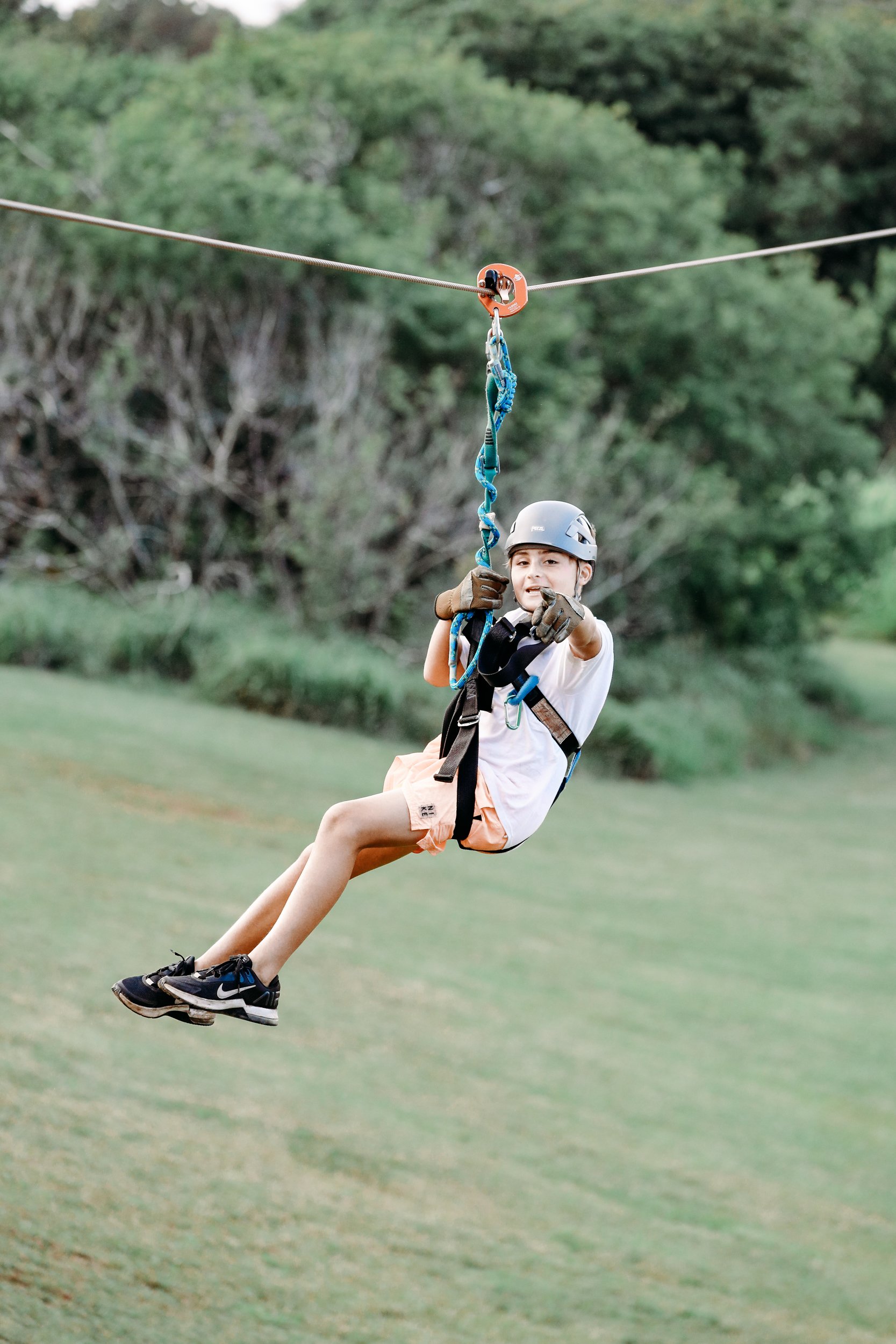 boy ziplining