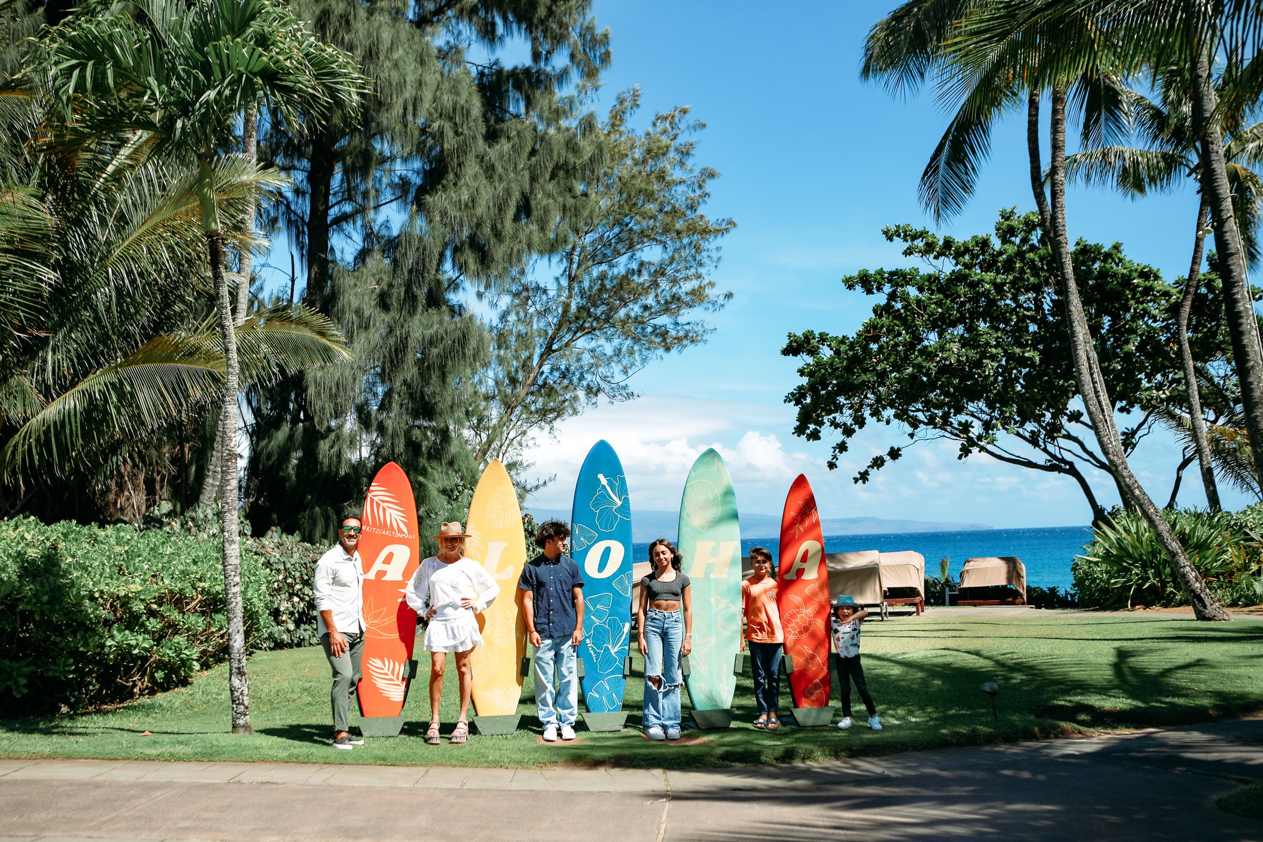 family by surfboards