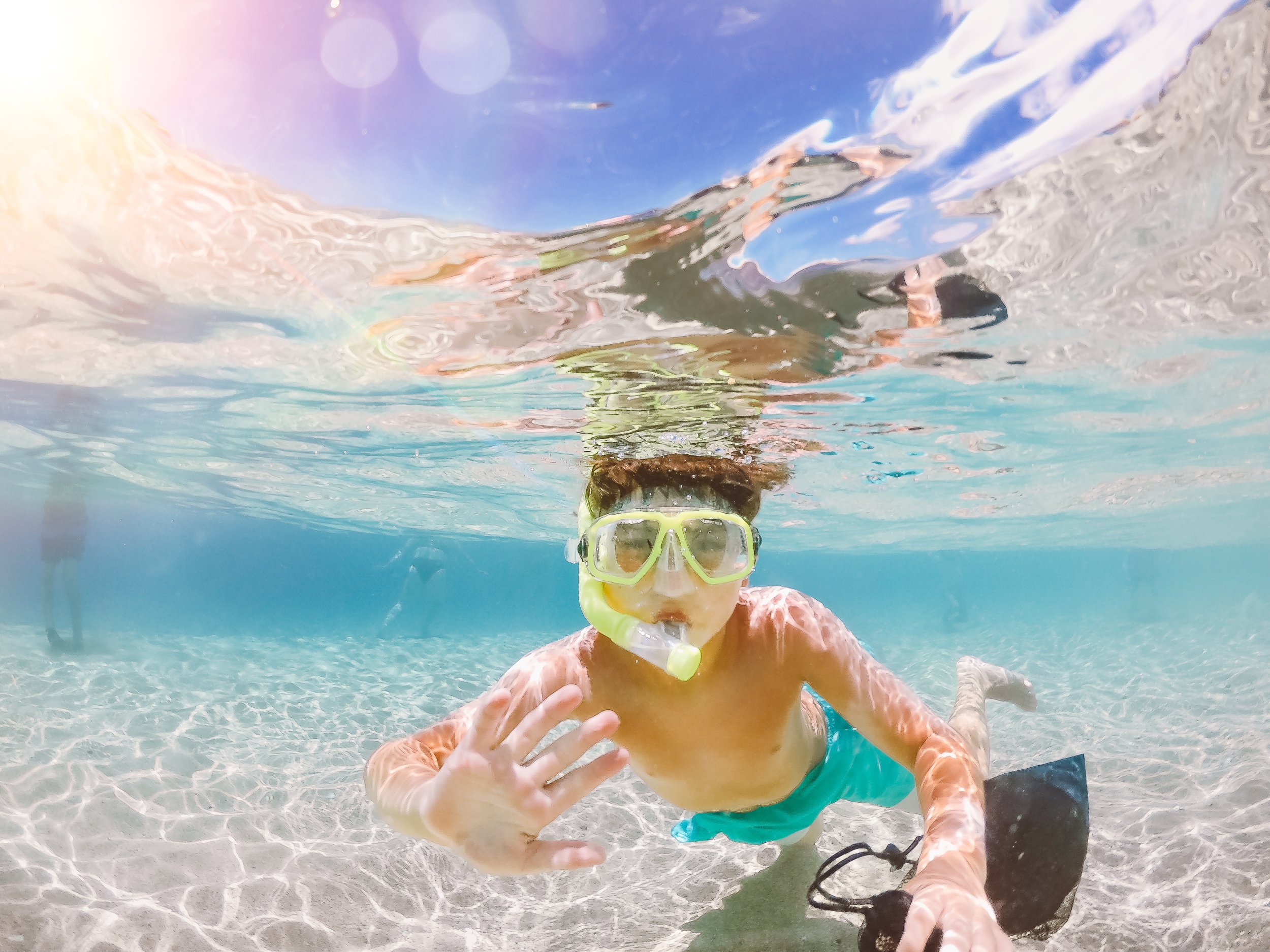 boy snorkeling