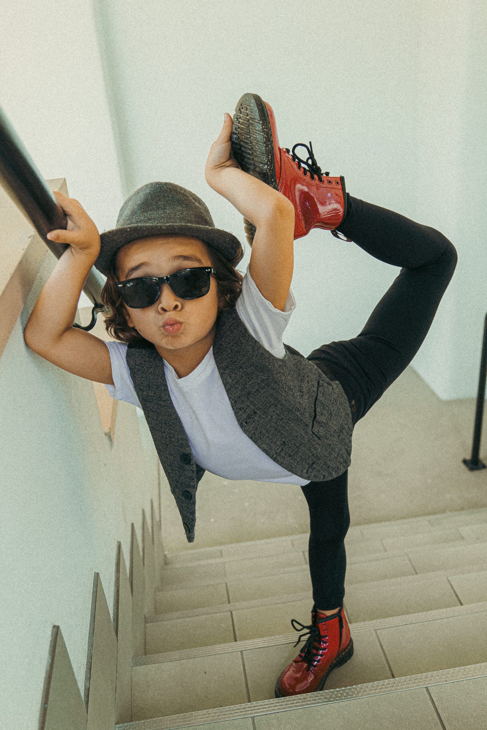 boy dancing on stairs