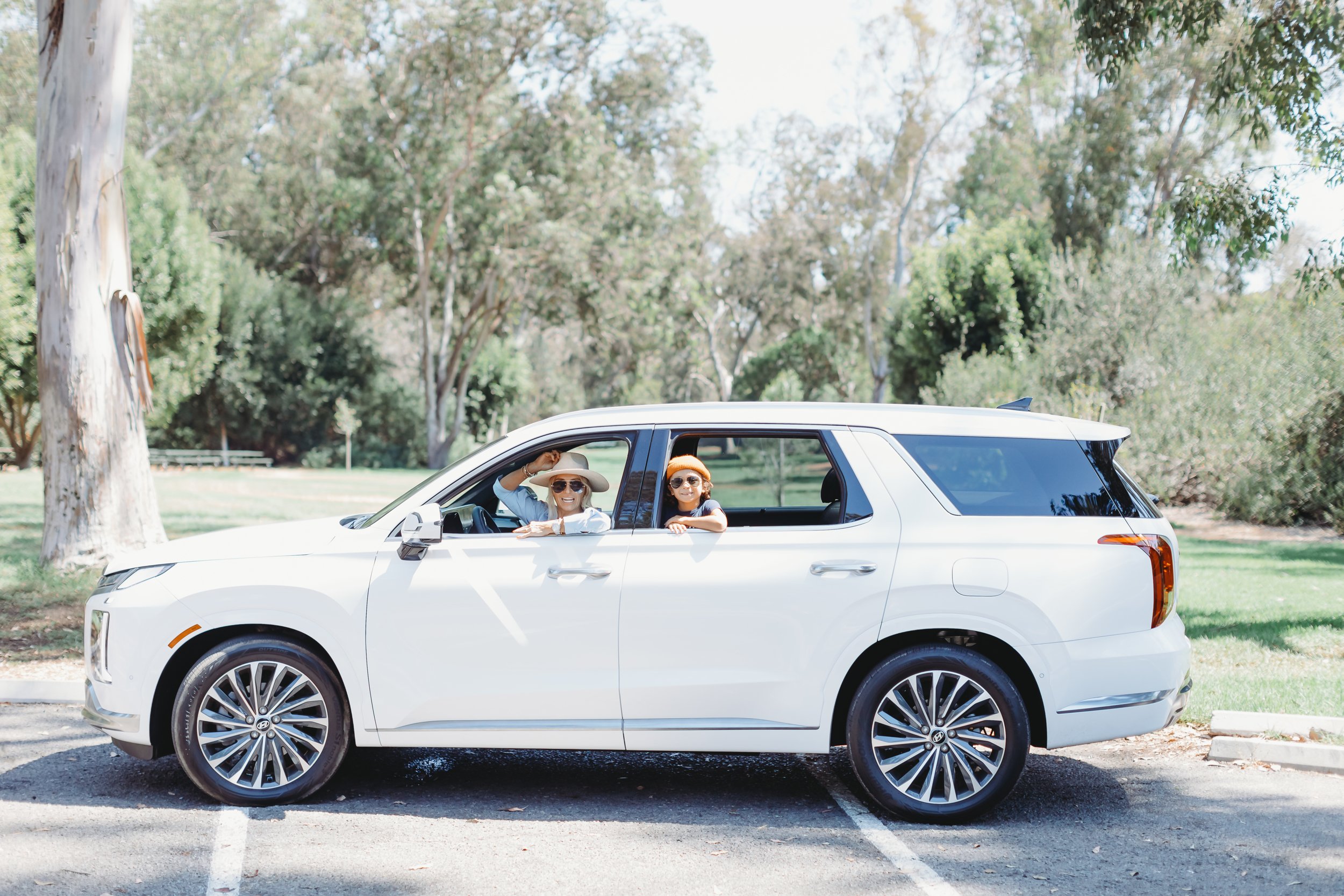 mom and son riding in their suv