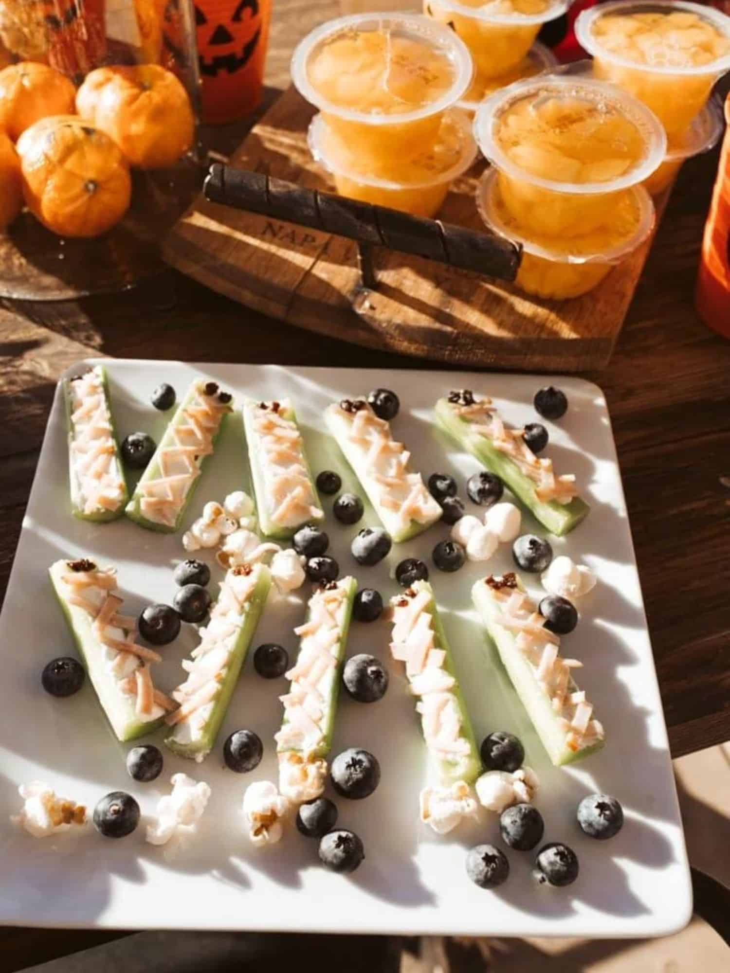 mummy celery sticks on a plate