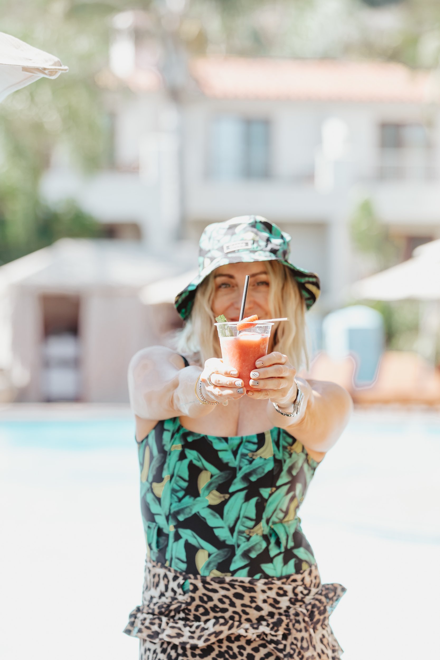 woman with a drink in hand