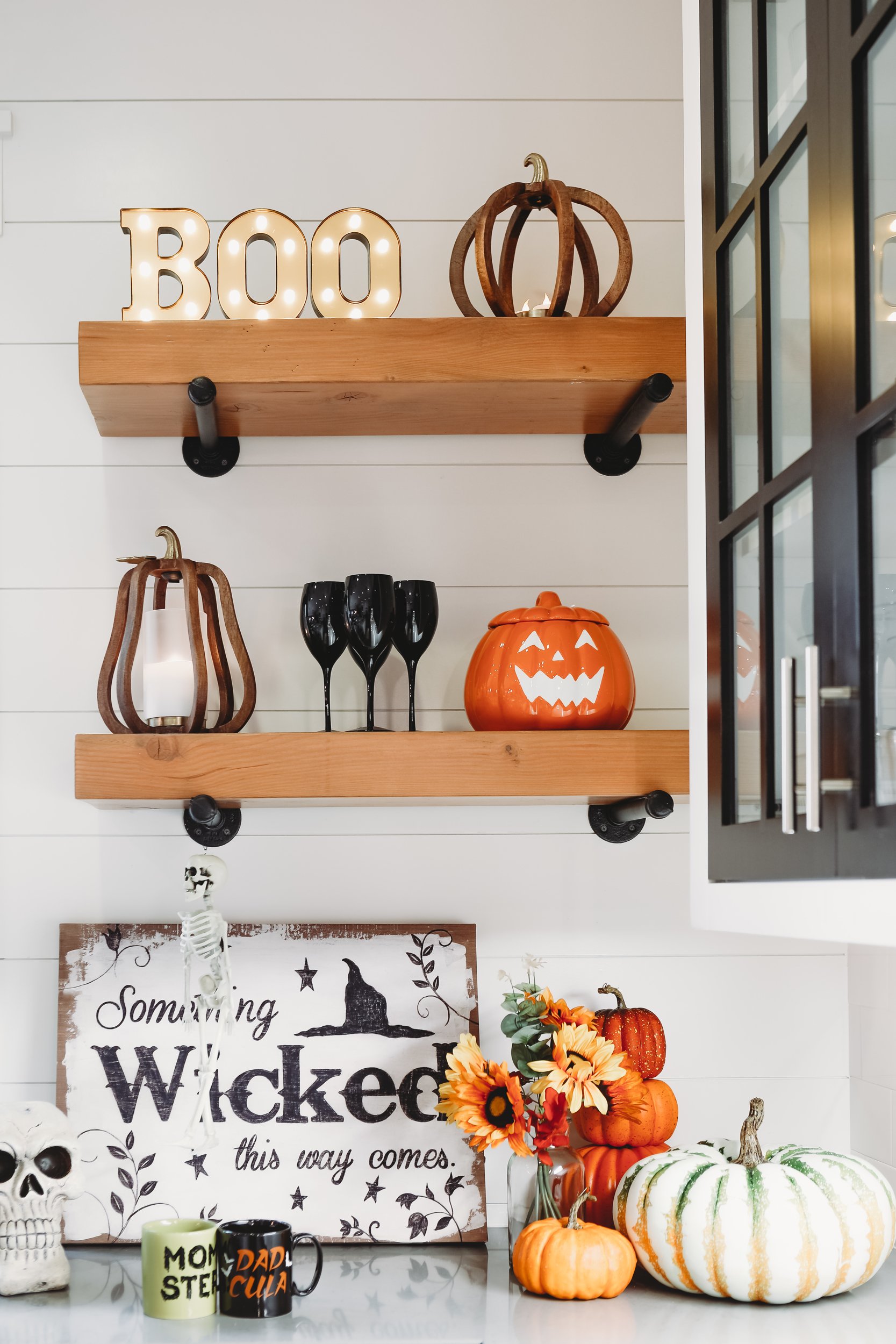 halloween decorations on kitchen shelves