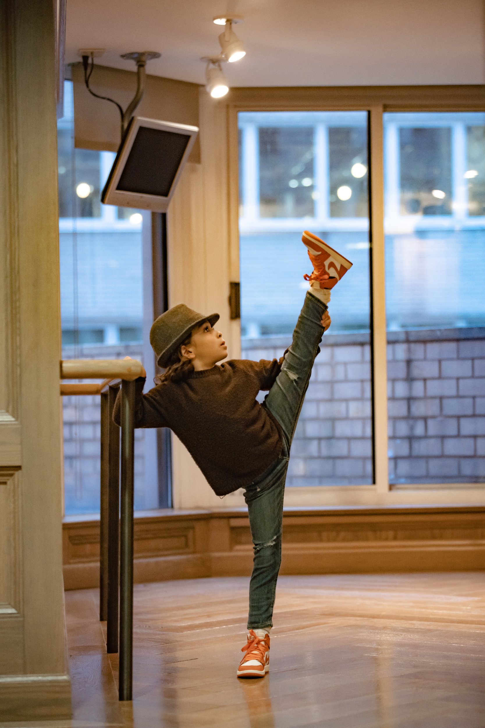 boy doing ballet in studio