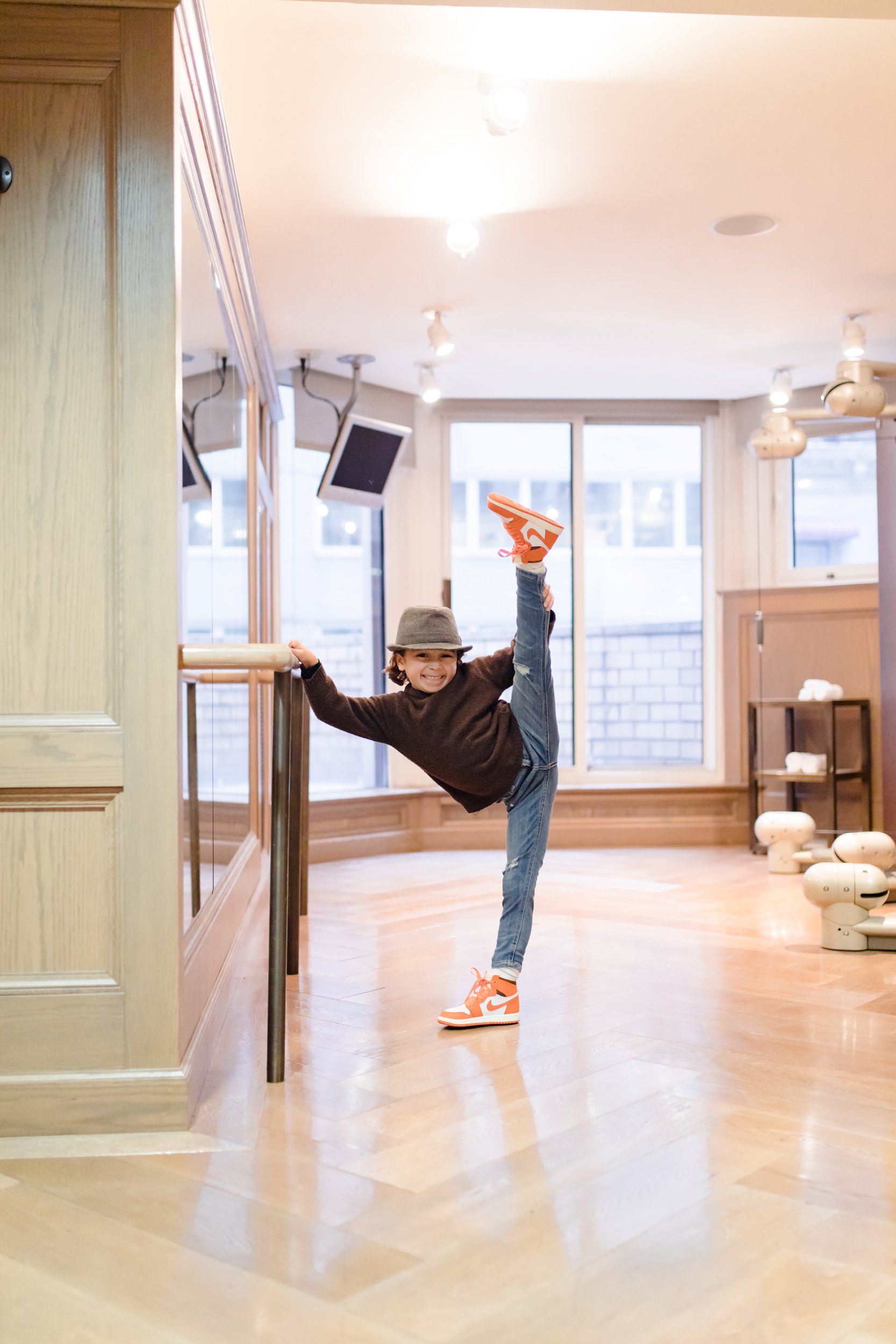 boy doing ballet in a studio